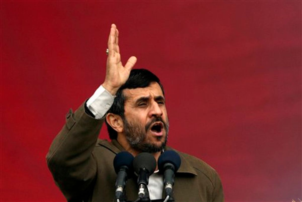 FILE -- In a Feb. 11, 2008 file photo Iranian President Mahmoud Ahmadinejad, speaks during a rally to celebrate the 29th anniversary of the 1979 Islamic Revolution at Azadi Square, Tehran, Iran. The website, khabaronline.ir, says a handmade grenade has exploded near President Mahmoud Ahmadinejad's convoy in western Iran. (AP Photo/Hasan Sarbakhshian/ file) (AP)