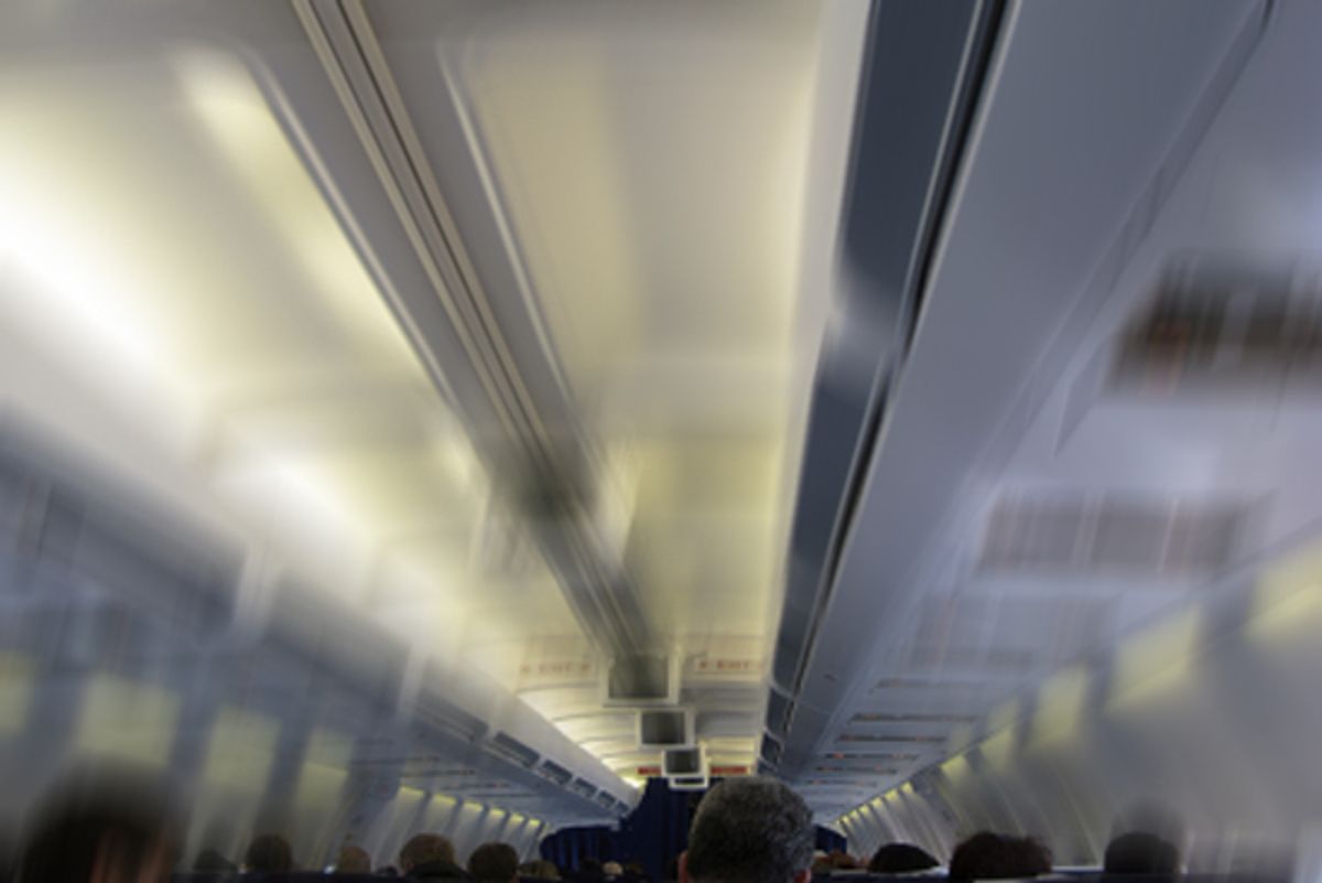 Passenger in a flight attendant jumpseat - Cabin Safety Made Easy