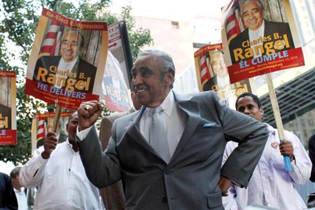 Congressman Charles Rangel pumps his fist while surrounded by supporters after attending a debate sponsored by the League of Women Voters,  Thursday, Aug. 26, 2010 in New York.  (AP Photo/Mary Altaffer) (AP)