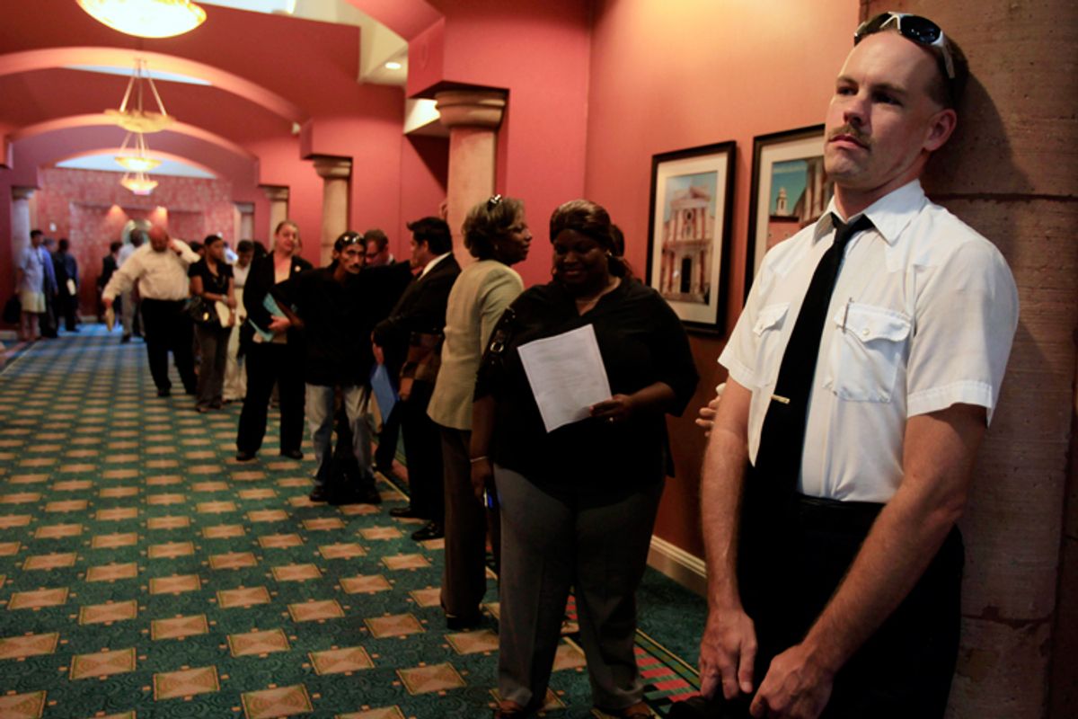 Joseph Oeler Jr., of Hollywood, Fla., waits in line at a job fair sponsored by National Career Fairs in Dania Beach, Fla.