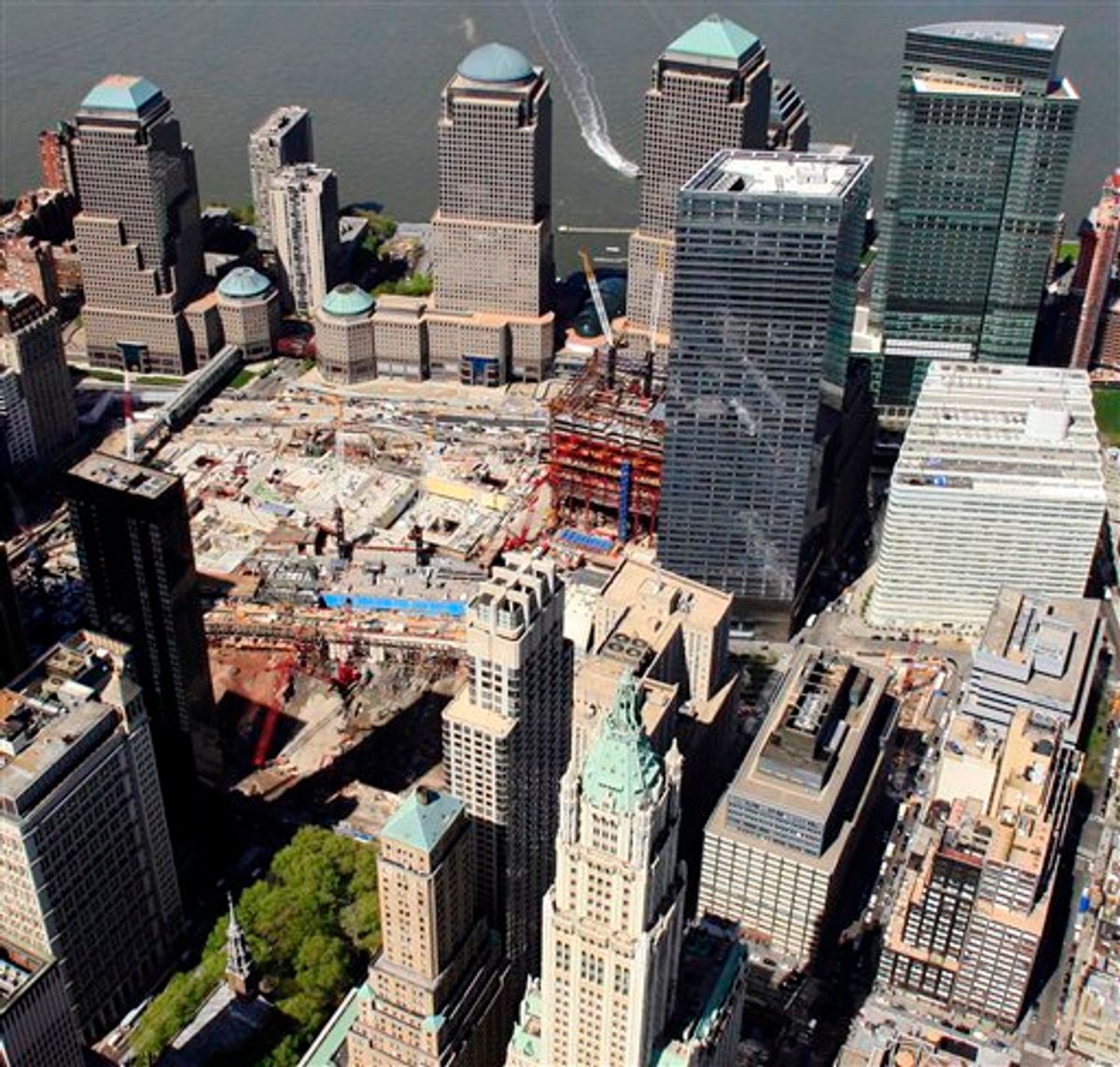 This aerial photo of April 20, 2010, shows the New York city block, lower right, where a 13-story mosque is planned for construction two blocks north of the World Trade Center site, center left. The plan for the $100 million mosque and cultural center received initial support on Wednesday, May  5, 2010 from community board 1 in Lower Manhattan. (AP Photo/Mark Lennihan) (AP)