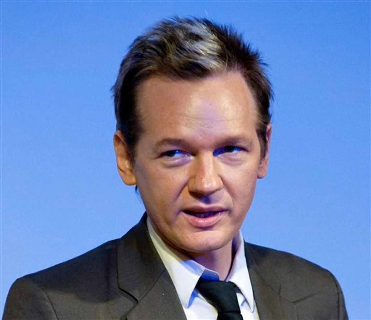 **ADDS THAT AUTHORITIES HAVE REVOKED ARREST WARRANT** FILE- This Aug. 14, 2010 file photo shows WikiLeaks founder Julian Assange in Stockholm, Sweden. A Stockholm prosecutor issued an arrest warrant for Assange on Friday Aug. 20, 2010, saying he was suspected of rape and molestation in two separate cases. But chief prosecutor Eva Finne withdrew the warrant within 24 hours. (AP Photo/SCANPIX, Bertil Ericson, File) SWEDEN OUT  (AP)