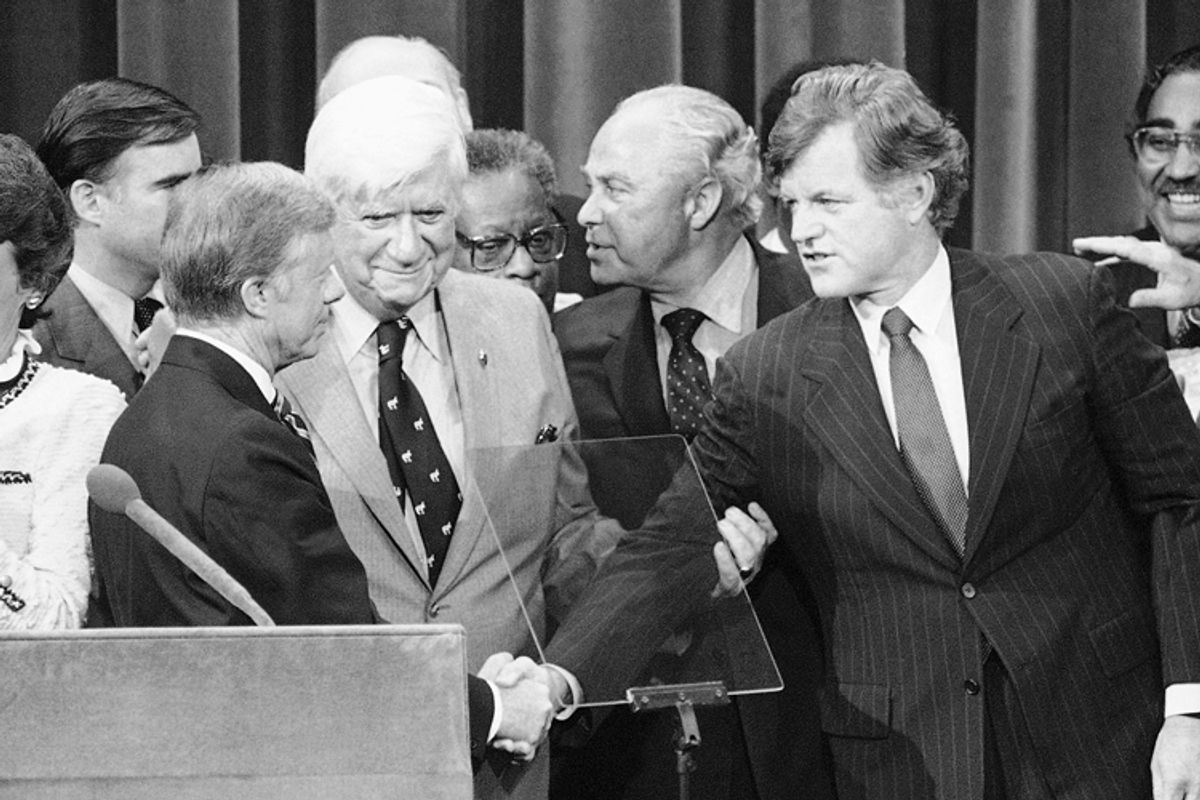 Jimmy Carter, left, shakes hands with Sen. Edward Kennedy on the podium at the Democratic National Convention in 1980.
