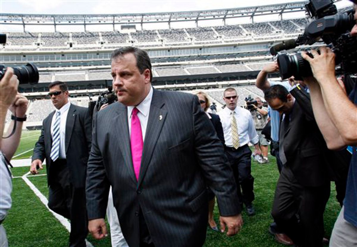 New Jersey Gov. Chris Christie leaves the new Meadowlands football stadium after news conference on Wednesday,  July 21, 2010, in East Rutherford, N.J. Christie announced the findings of a panel that reviewed the state's gambling, entertainment and sports industries. The recommendations include a nearly complete state takeover of Atlantic City's casino district, closing the Meadowlands Racetrack and selling the Izod Center. (AP Photo/ Mel Evans) (Mel Evans)