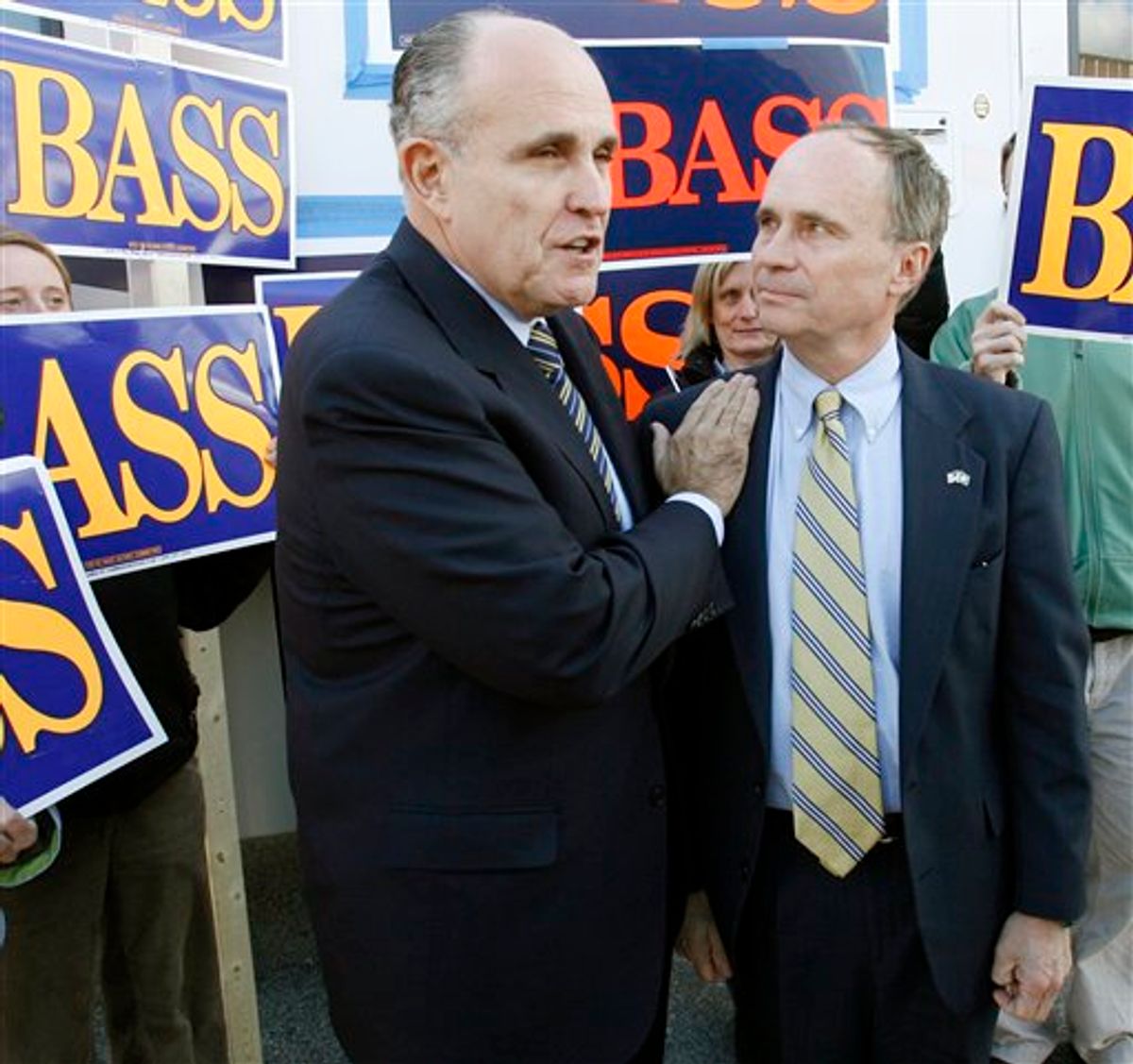 FILE - In this Nov. 3, 2006 file photo, former New York Mayor Rudy Giuliani,left, endorses Rep. Charlie Bass, R-N.H., right, during a special campaign stop at the airport in Nashua, N.H. (AP Photo/Jim Cole, File) (AP)