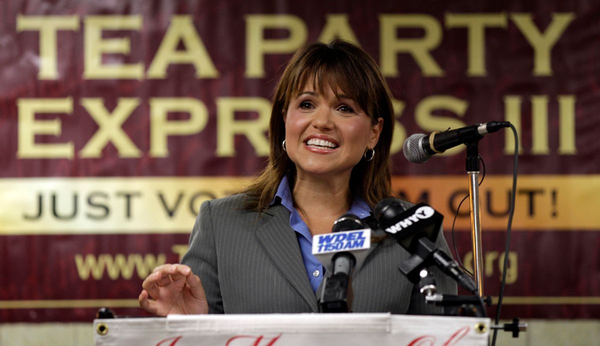 Christine O'Donnell, a candidate for the U.S. Senate, addresses supporters during a Tea Party Express news conference in support of her election bid, Tuesday, Sept. 7, 2010, in Wilmington, Del. (AP Photo/Rob Carr) (Rob Carr)