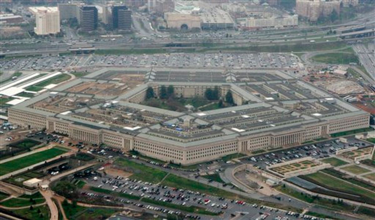 File - The Pentagon is seen in this aerial view in Washington, in this March 27, 2008 file photo. The WikiLeaks website appears close to releasing what the Pentagon fears is the largest cache of secret U.S. documents in history _ hundreds of thousands of intelligence reports compiled after the 2003 invasion of Iraq. In a message posted to its Twitter page on Thursday Oct. 21, 2010, the organization said there was a "major WikiLeaks press conference in Europe coming up."  (AP Photo/Charles Dharapak, File) (AP)