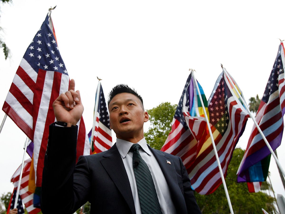 Lieutenant Dan Choi, who was recently dismissed from the U.S. Army for admitting he was gay, speaks during a rally outside the Beverly Hilton hotel, where U.S. President Barack Obama was attending a Democratic party fundraiser, in Beverly Hills, California May 27, 2009. California's supreme court backed a ban on gay marriage on Tuesday, upholding the voter-approved Proposition 8 defining marriage as between a man and a woman, but said the marriages last year of 18,000 same sex couples were still legal. REUTERS/Mario Anzuoni   (UNITED STATES POLITICS CONFLICT)   (Â© Mario Anzuoni / Reuters)