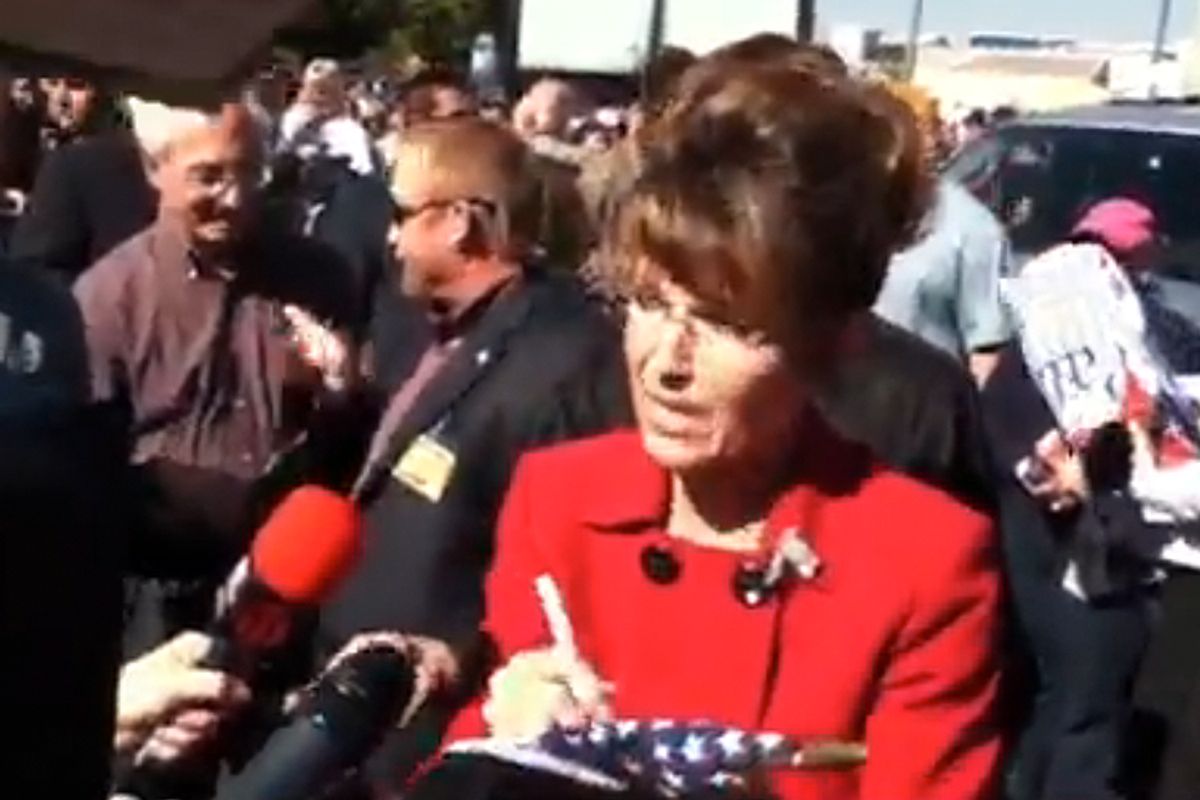 While campaigning in Reno this week, Sarah Palin puts her signature to...something           
