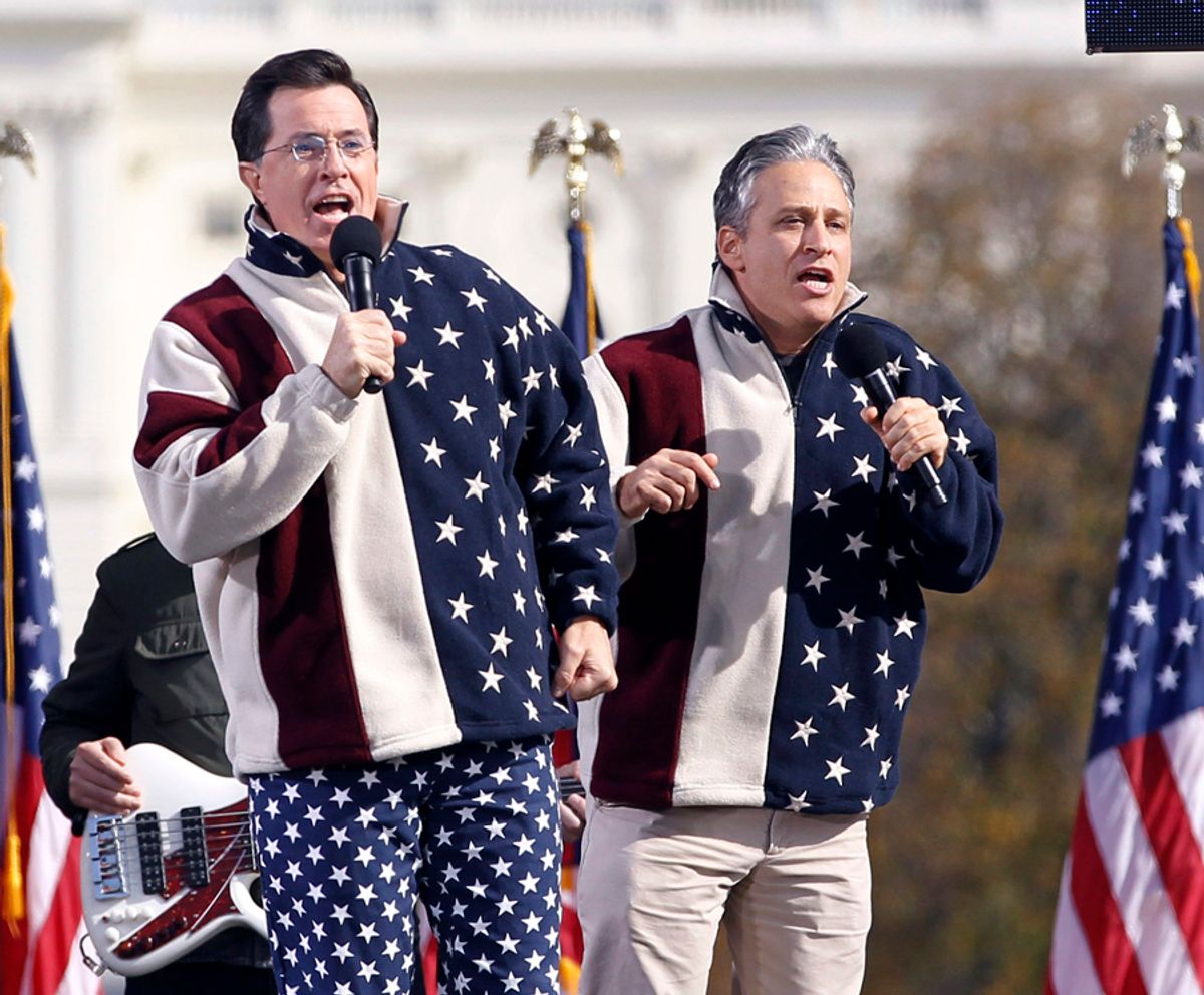 Comedians Jon Stewart (R) and Stephen Colbert sing during the "Rally to Restore Sanity and/or Fear" on the Washington Mall, October 30, 2010. REUTERS/Jason Reed  (UNITED STATES - Tags: ENTERTAINMENT POLITICS CIVIL UNREST IMAGES OF THE DAY) (Â© Jason Reed / Reuters)