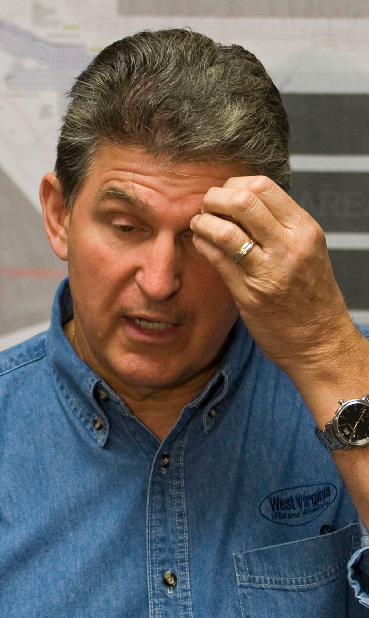 West Virginia Governor Joe Manchin gestures as he speaks during a news conference in Montcoal, West Virginia on April 7, 2010. Drills broke through into a West Virginia mine early on Wednesday but rescuers detected no sign of the four miners missing since an explosion killed 25 people in a major U.S. mine disaster.  REUTERS/Chris Keane (UNITED STATES - Tags: DISASTER ENERGY POLITICS)           (Â© Chris Keane / Reuters)