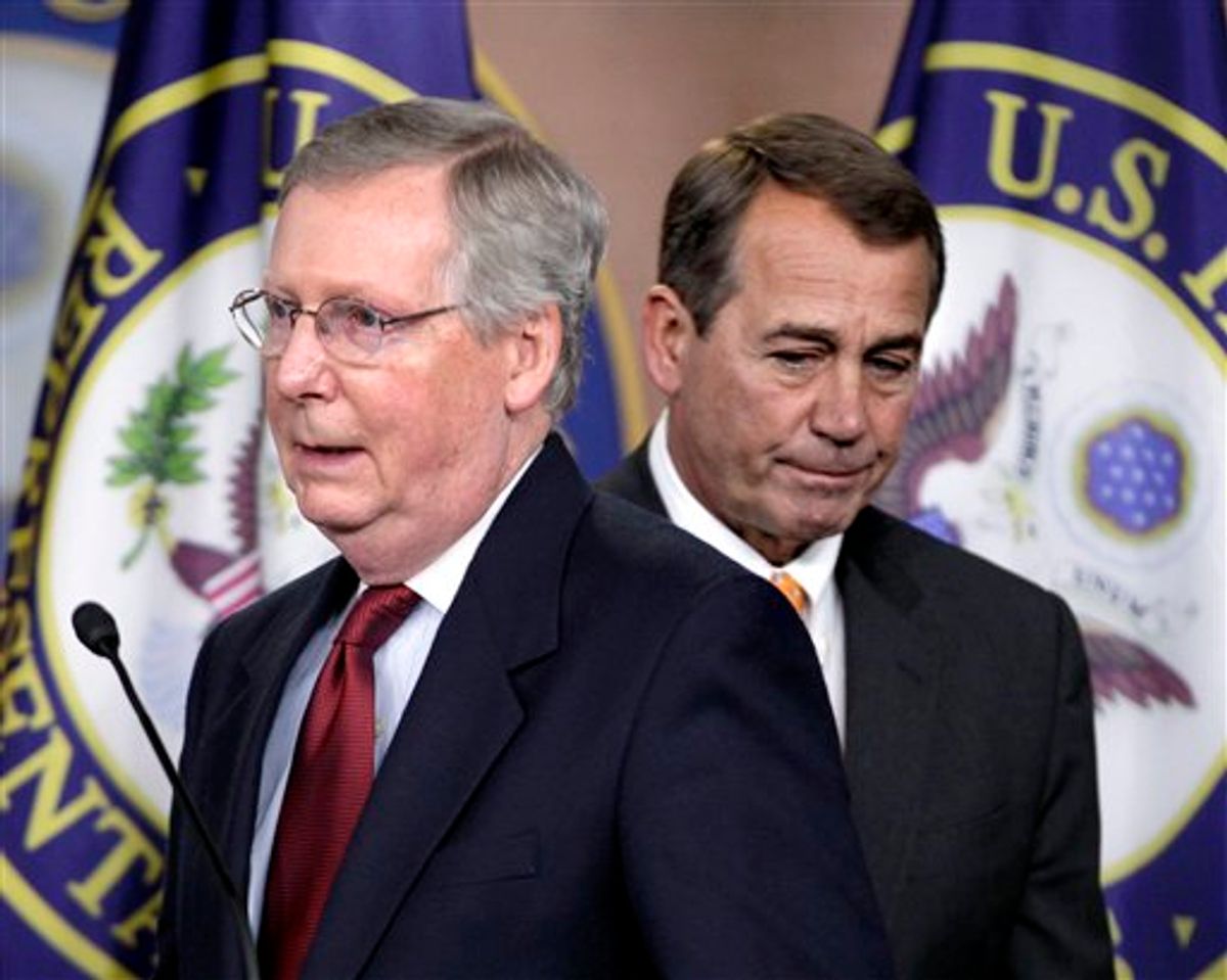 House Republican leader John Boehner of Ohio, right, and Senate Minority Leader Mitch McConnell of Ky., left, swap positions at the microphones to answer questions on the sweeping GOP victory in the 2010 midterm elections, Wednesday, Nov. 3, 2010, during a news conference on Capitol Hill in Washington . (AP Photo/J. Scott Applewhite)  (AP)