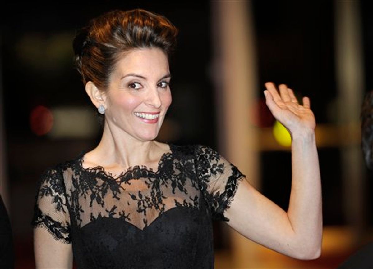 Tina Fey waves to fans as she arrives at the Kennedy Center where she was awarded the Mark Twain Prize for humor in Washington, Tuesday, Nov. 9, 2010. (AP Photo/Cliff Owen)  (AP)