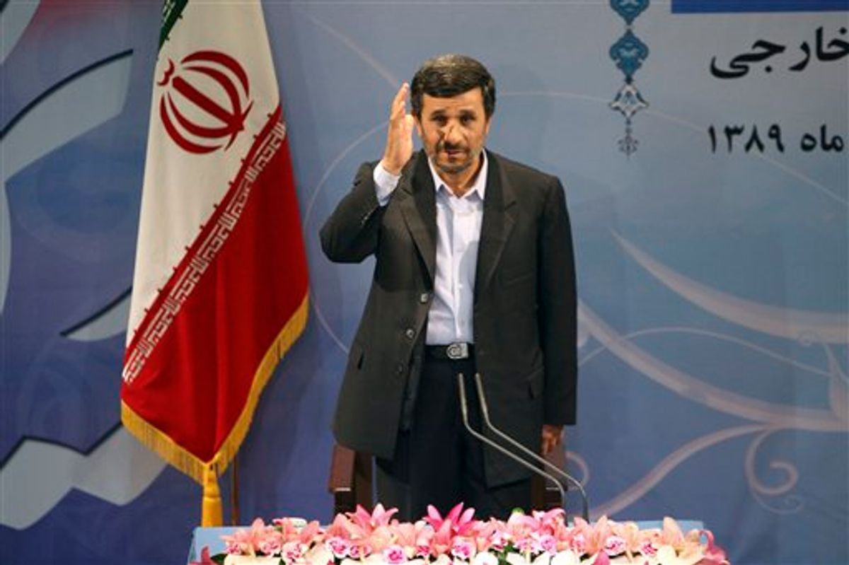 Iranian President Mahmoud Ahmadinejad waves to media as he arrives for his press conference in Tehran, Iran, Monday, Nov. 29, 2010. (AP Photo/Vahid Salemi) (AP)