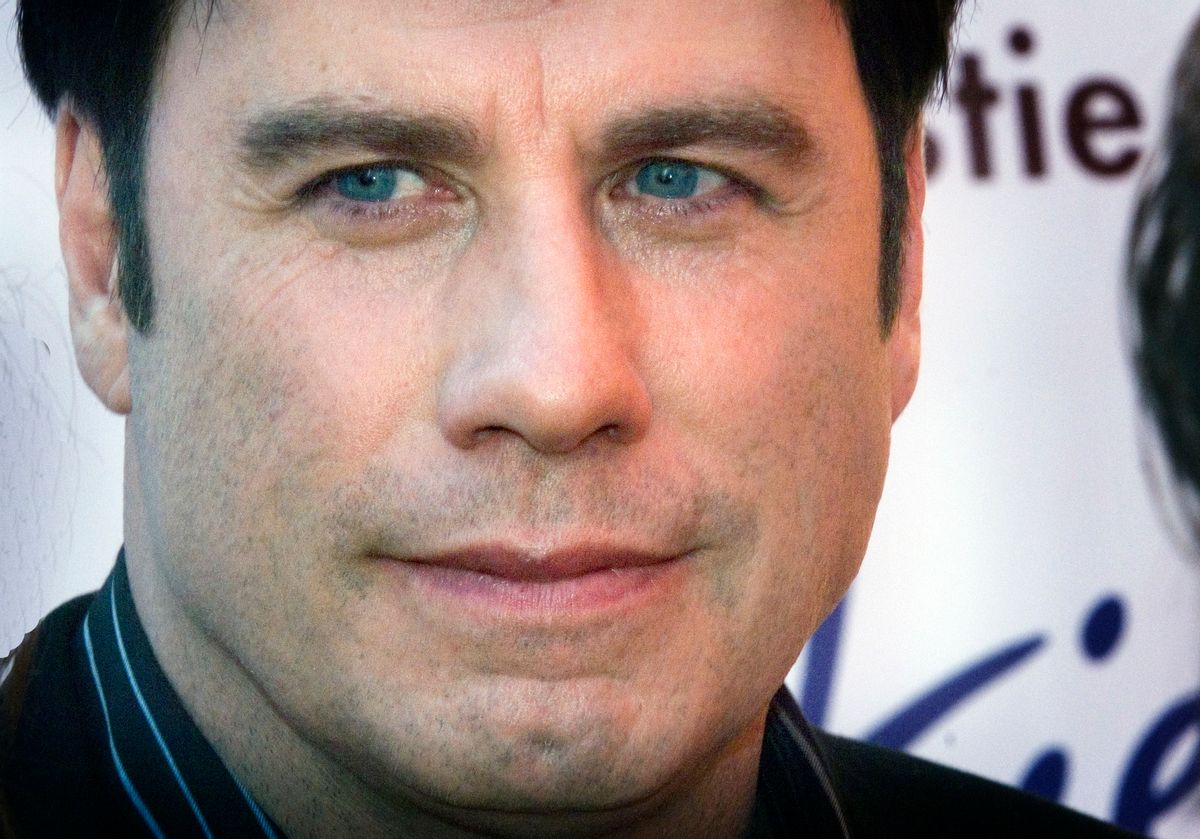 John Travolta listens to reporters questions at a fundraiser for Narconon International in Honolulu, Thursday, May 24, 2007. Travolta's wife, actress Kelly Preston organized the $2,500 a plate dinner to raise funds for the first narconon drug rehabilitation facility on the islands.  (AP Photo/Lucy Pemoni)       (Associated Press)