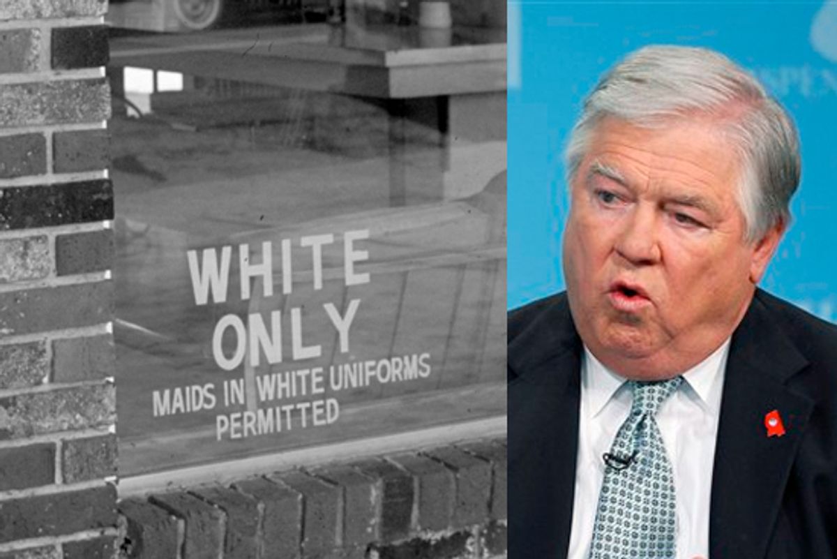 Detail of an undated photo of a "white only" sign posted in a window in Louisiana. Right: Gov. Haley Barbour.
