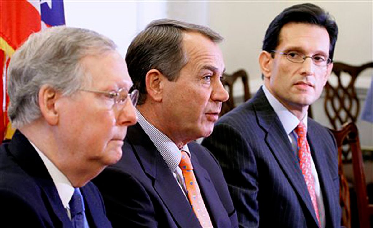 House Minority Leader John Boehner of Ohio, center, accompanied by Senate Minority Leader Mitch McConnell of Ky., left, and House Minority Whip Eric Cantor of Va. speaks during a news conference on Capitol Hill in Washington, Tuesday, Nov. 30, 2010, after their meeting with President Barack Obama. (AP Photo/Harry Hamburg)             (Harry Hamburg)