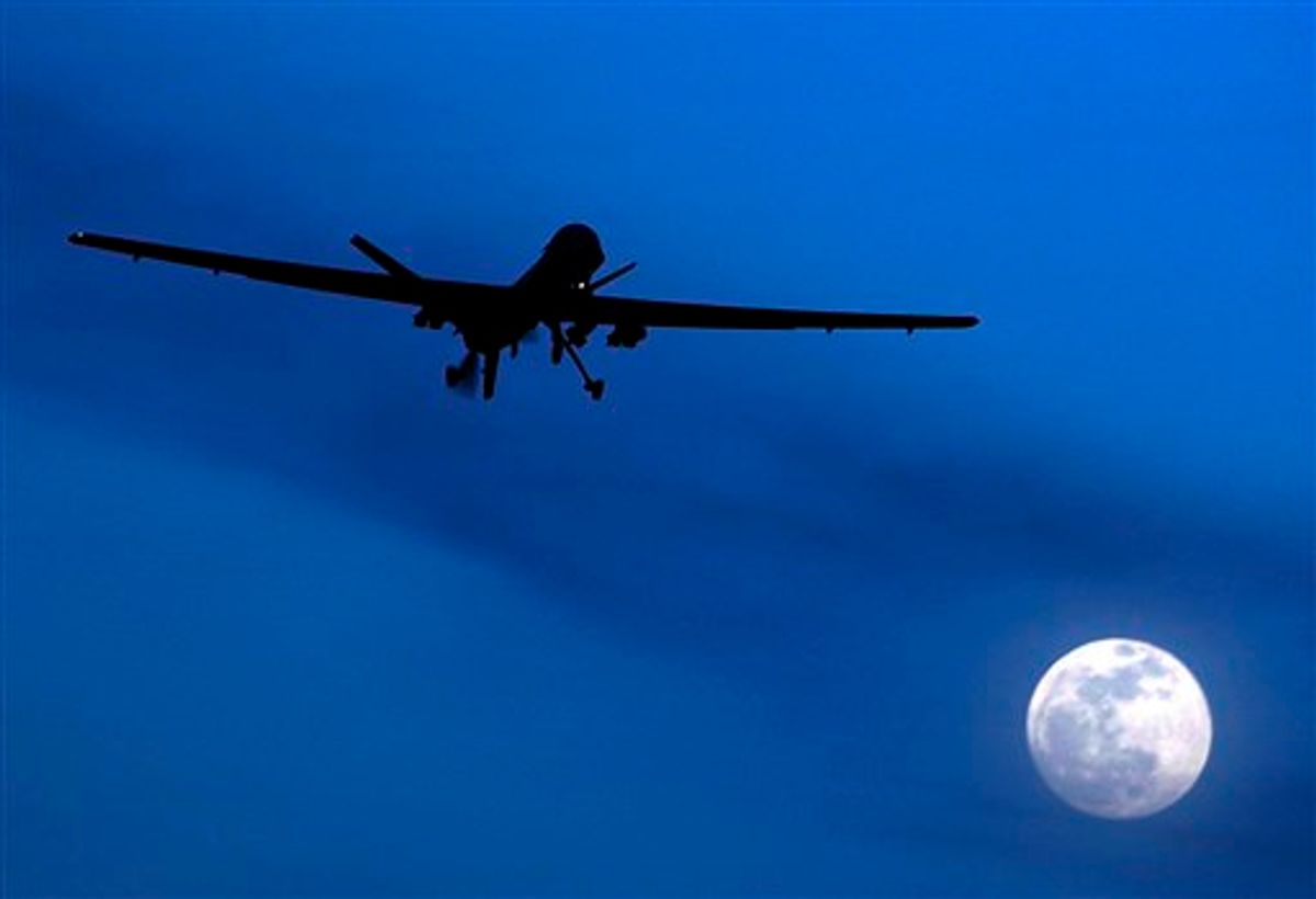**CORRECTS DATE OF STATEMENT BY EUROPEAN OFFICIALS** FILE - In this Jan. 31, 2010 file photo, a U.S. Predator drone flies over the moon above Kandahar Air Field, southern Afghanistan. European security officials said Wednesday Sept. 29, 2010, a terror plot to wage Mumbai-style shooting sprees or other low-budget attacks in Britain, France and Germany is still active and that sites in Pakistan _ where the threat was intercepted _ are being targeted for al-Qaida operatives. The Obama administration intensified the use of drone-fired missiles in Pakistan's border area, but this month there have been at least 21 attacks _ more than double the highest number fired in any other single month. (AP Photo/Kirsty Wigglesworth, File)  (AP)