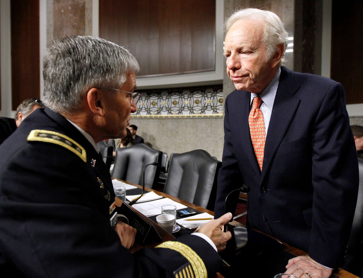 Senate Armed Service Committee Sen. Joseph Lieberman, I-Conn., right, talks with Army Chief of Staff  Gen. George Casey Jr., on Capitol Hill in Washington Friday, Dec. 3, 2010, before the start of the committee's hearing on the military Don't Ask Don't Tell policy. (AP Photo/Alex Brandon)   (Associated Press)