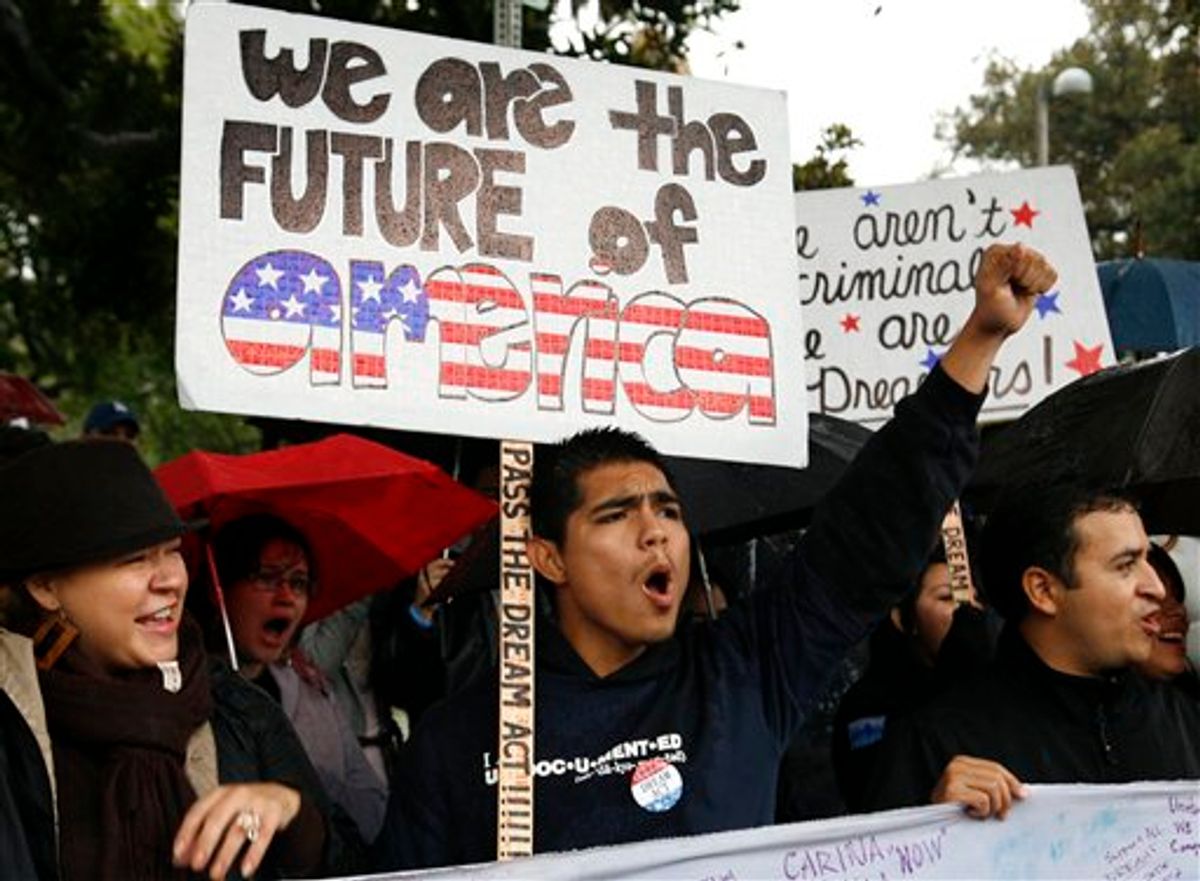 Undocumented college student Jorge Herrera, 18, center, of Carson, Calif., rallies with students and Dream Act supporters in Los Angeles, Saturday, Dec. 18, 2010. The Dream Act, which failed to move on in the Senate, would have given provisional legal status to illegal immigrants brought to the country as children. (AP Photo/Jason Redmond) (AP)