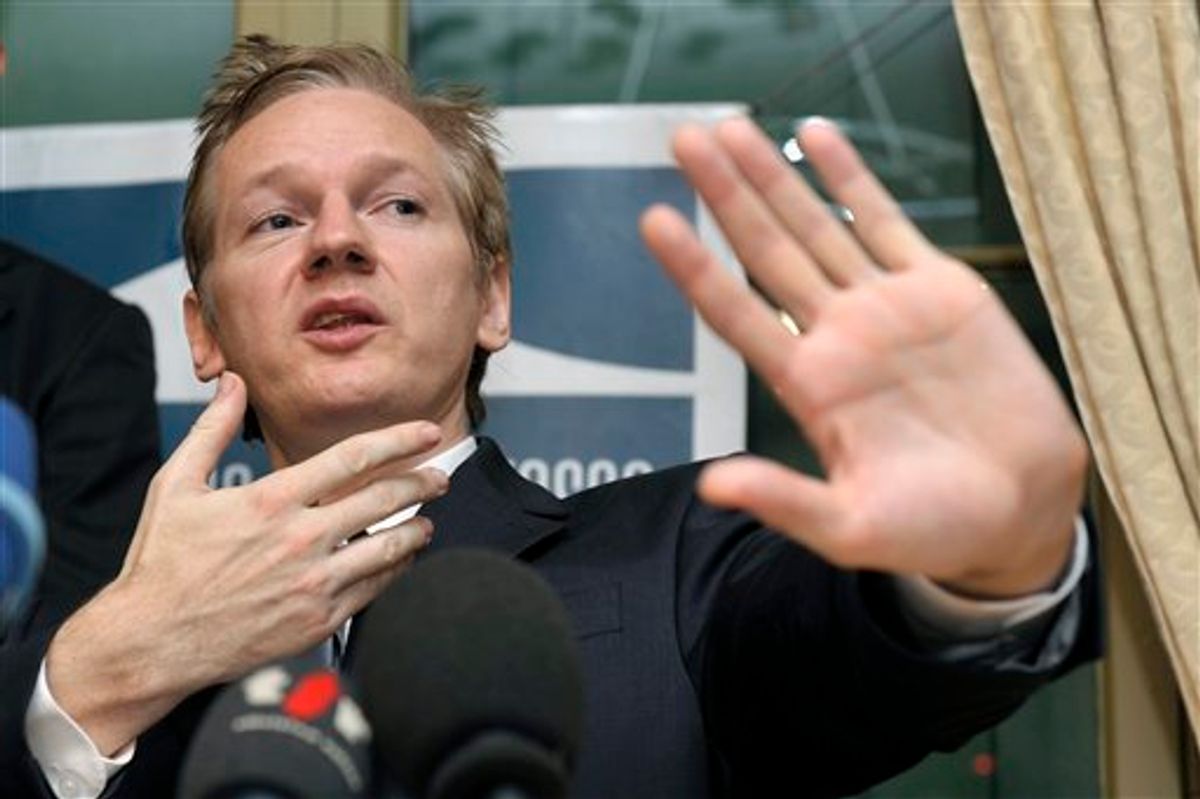 FILE - This is a Thursday, Nov. 4, 2010 file photo of  Wikileaks founder Julian Assange gestures as he speaks about the United States and the human rights during a press conference at the Geneva press club in Geneva, Switzerland. Police say WikiLeaks founder Julian Assange has been arrested on Swedish warrant on Tuesday Dec. 7, 2010. (AP Photo/Keystone, Martial Trezzini, File)      (AP)