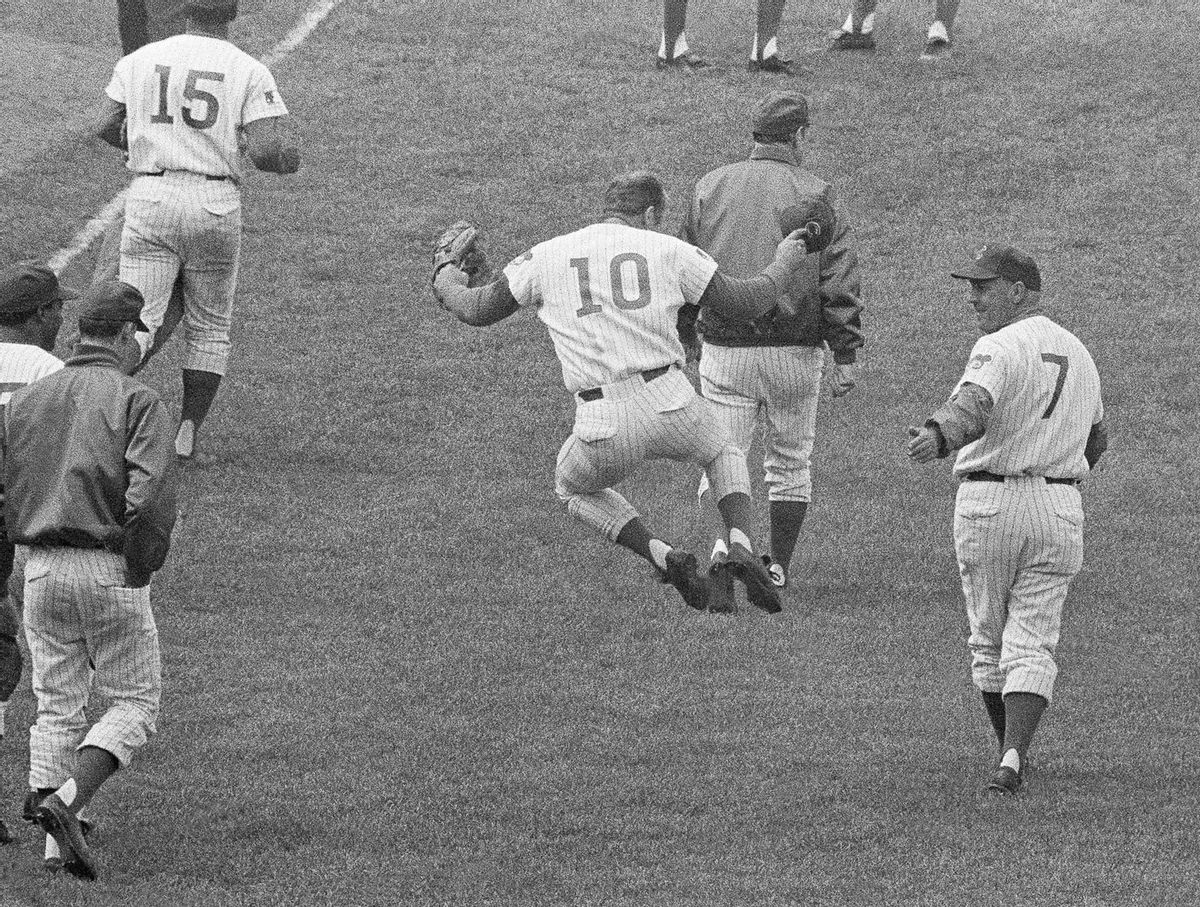 FILE - This June 24, 1969, file photo, shows Chicago Cubs third baseman Ron Santo (10) clicking his heels on the way to the locker room after his ninth-inning sacrifice fly allowed the winning run to score for a 5-4 victory over the Pittsburgh Pirates,  in Chicago. Santo died Thursday, Dec. 2, 2010, in an Arizona hospital from complications of bladder cancer. He was 70.  (AP Photo) (Anonymous)