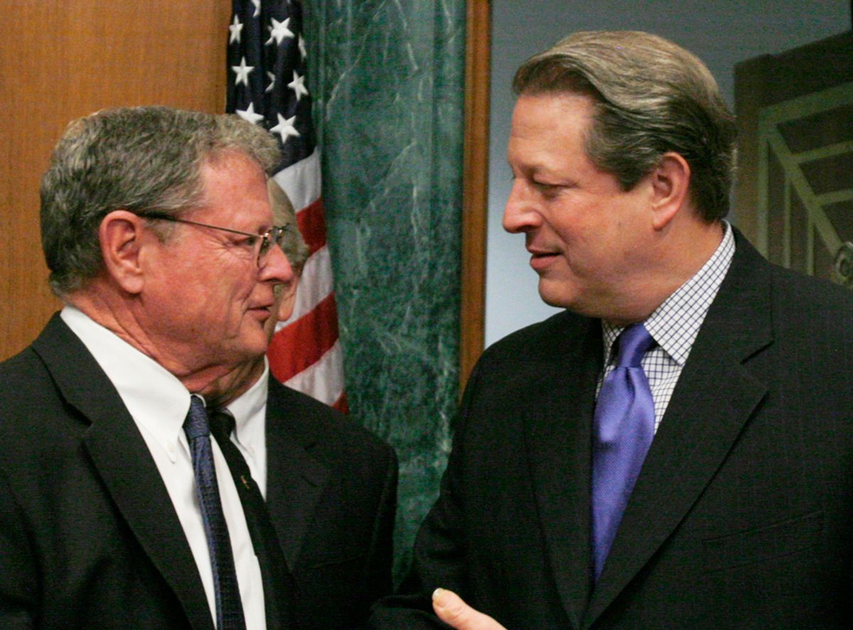 Former U.S. Vice President Al Gore (C) speaks to Senate Environment and Public Works Committee members Sen. Barbara Boxer (D-CA)(R) and Sen. James Inhofe (R-OK) on Capitol Hill in Washington, March 21, 2007.   REUTERS/Jim Young    (UNITED STATES)     (Â© Jim Young / Reuters)