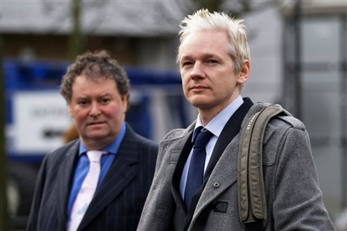 WikiLeaks founder Julian Assange, right, and his lawyer Mark Stephens arrive at Belmarsh Magistrate's court in London for his extradition hearing, Tuesday, Jan. 11, 2011. (AP Photo/Sang Tan) (AP)