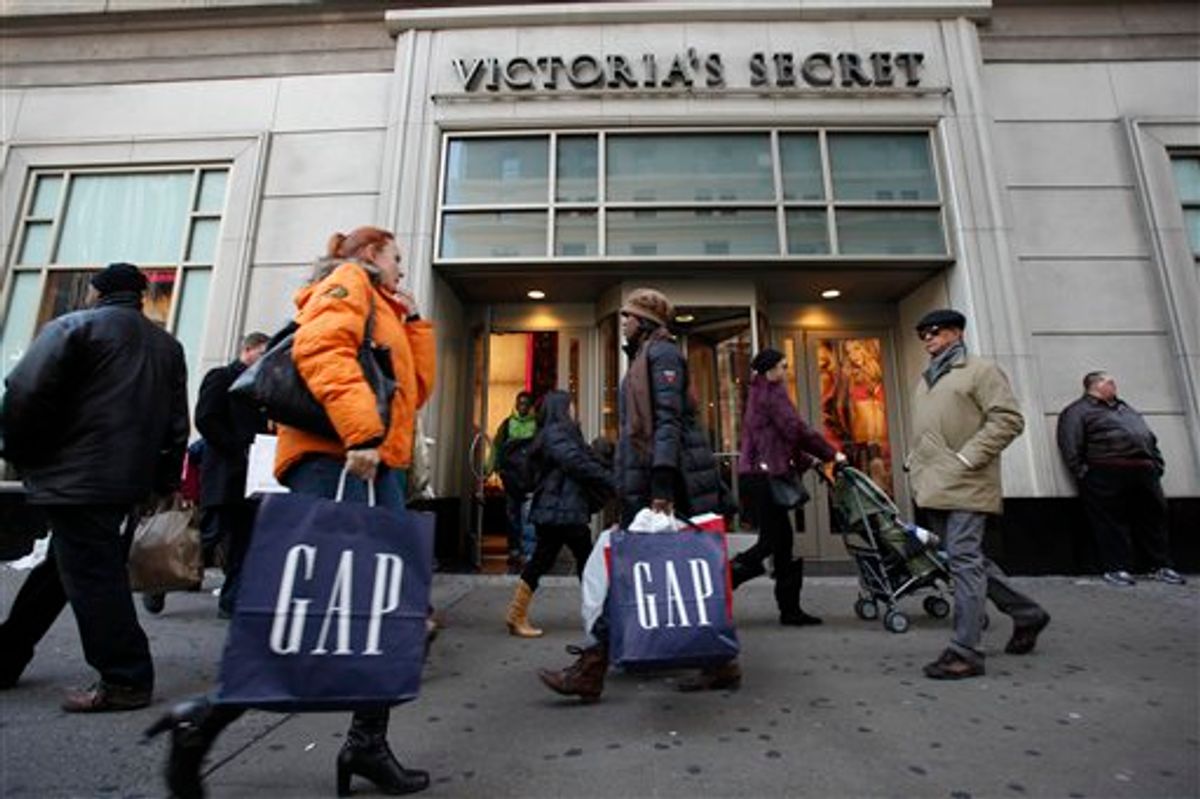 FILE - In this Dec. 18, 2010 file photo, shoppers are photographed on 34th Street, in New York. Retail sales rise for the sixth month in December, capping a rebound year following a deep recession. (AP Photo/Mary Altaffer, file) (AP)