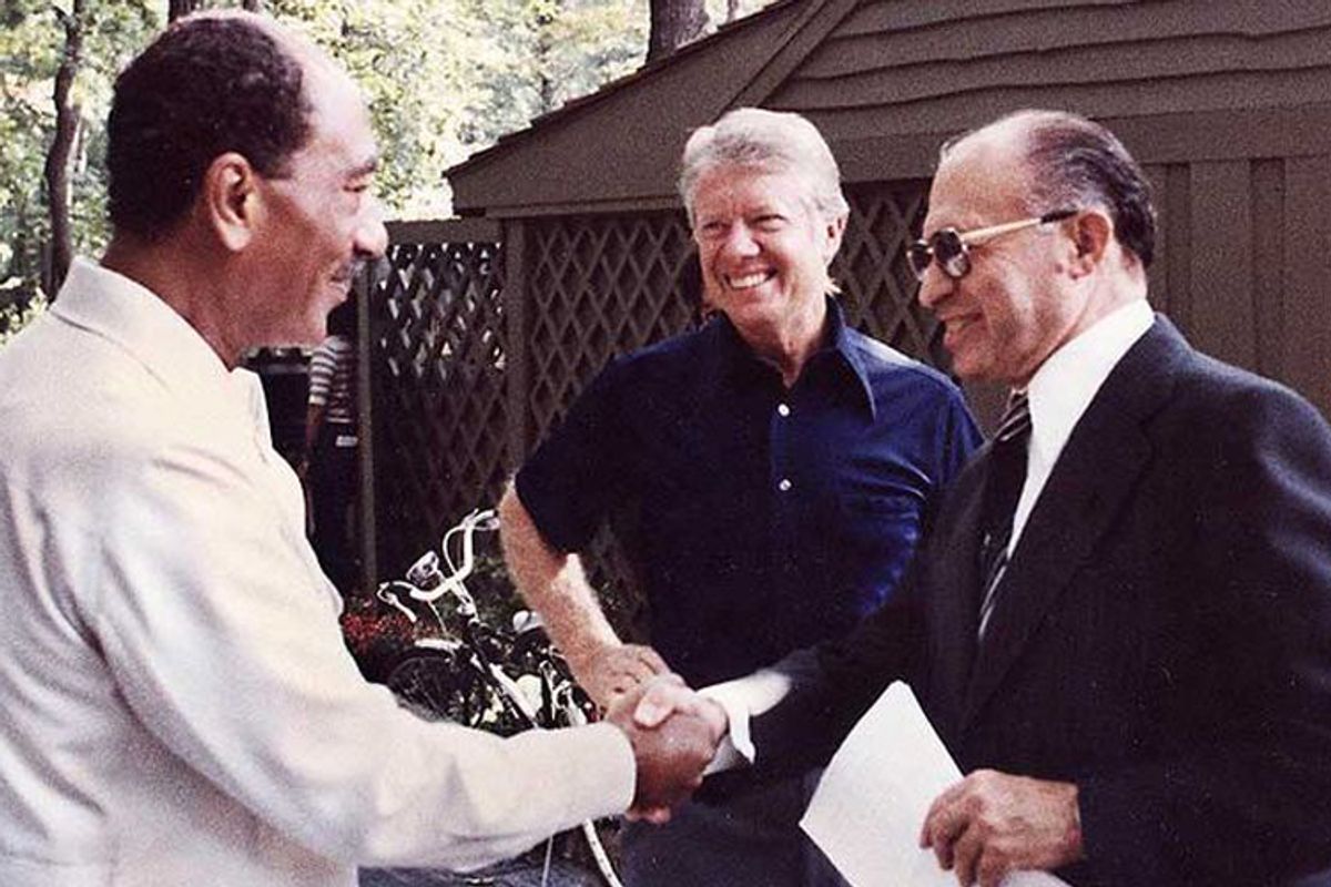 Anwar Sadat, Jimmy Carter and Menachem Begin at Camp David in 1978.  