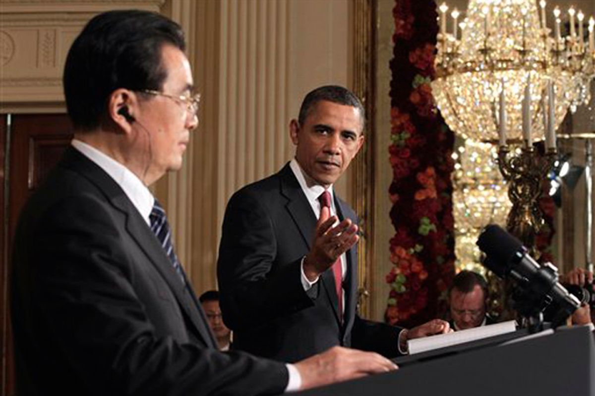 President Barack Obama gestures during his joint news conference with China's President Hu Jintao, Wednesday, Jan. 19, 2011, in the East Room of the White House in Washington. (AP Photo/J. Scott Applewhite)  (J. Scott Applewhite)