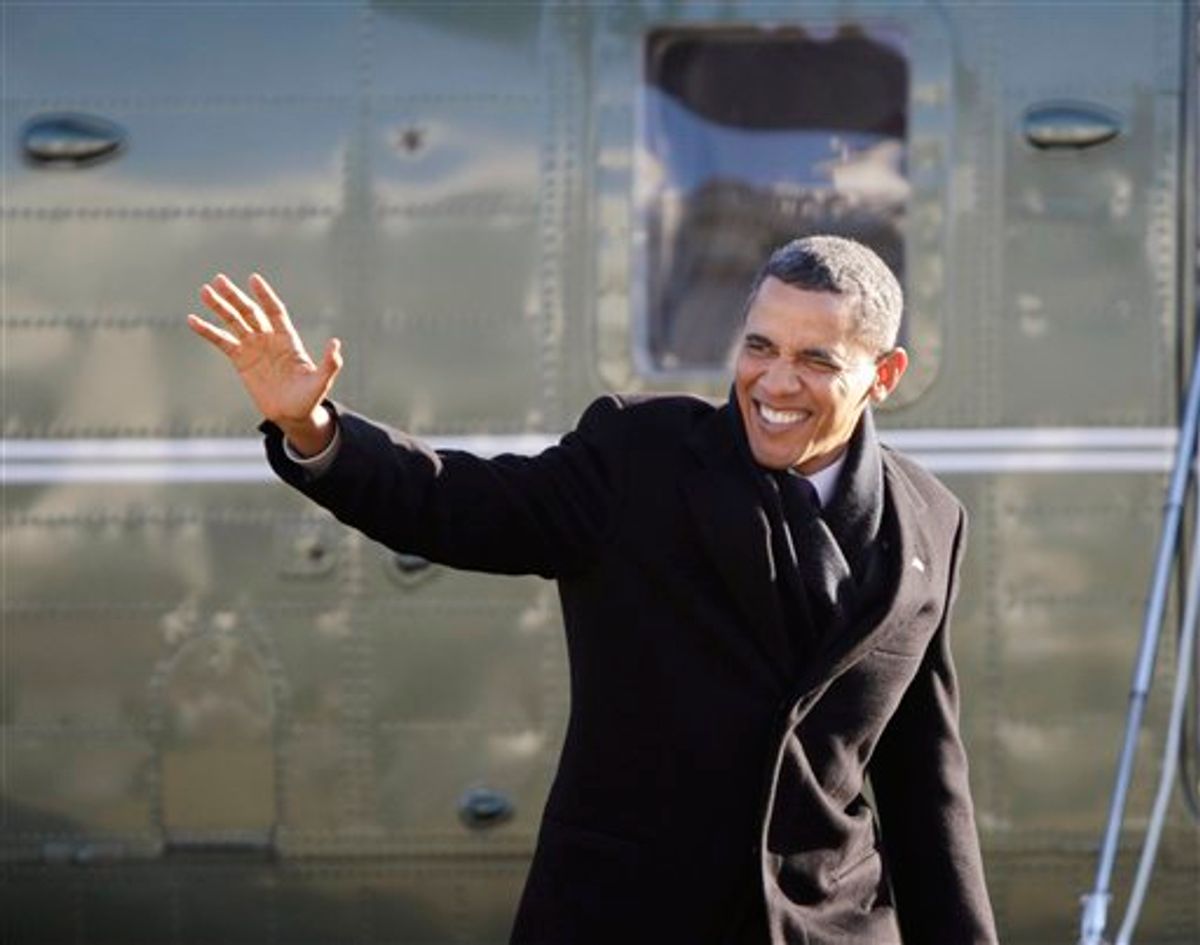 President Barack Obama waves as he arrives on the South Lawn of the White House in Washington, Friday, Jan. 21, 2011,  from a trip to Schenectady, N.Y. (AP Photo/Pablo Martinez Monsivais) (AP)
