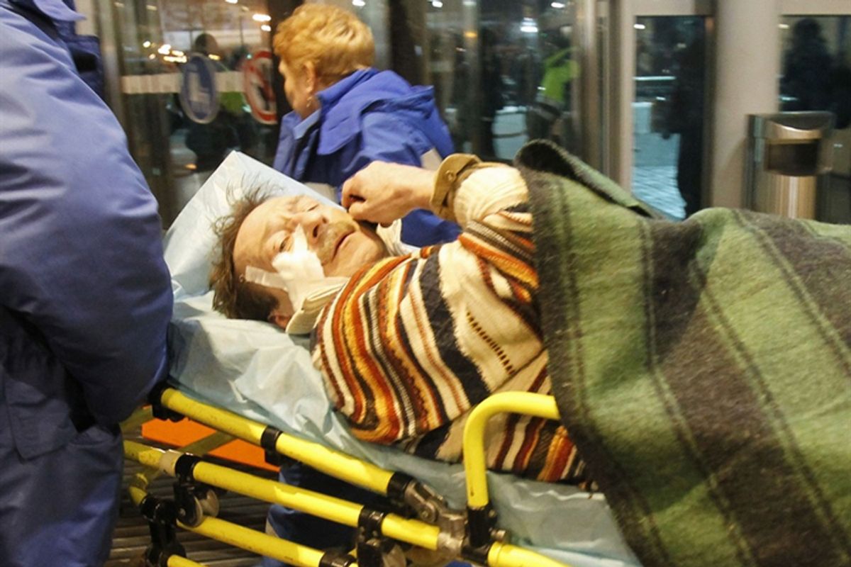 Medics attend to a victim of a bomb explosion at Moscow's Domodedovo airport on Monday.