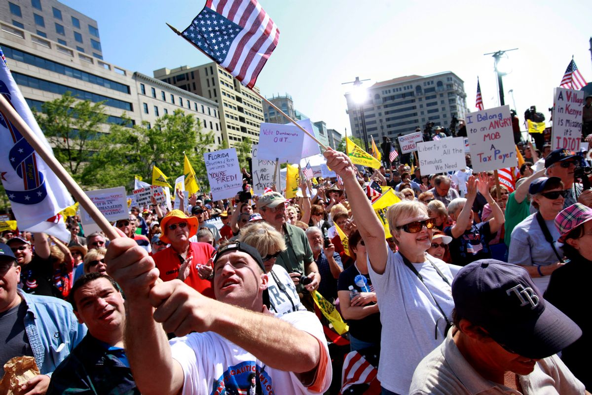 People attend a tea party protest in Washington, Thursday, April 15, 2010. (AP Photo/Jacquelyn Martin) (Associated Press)