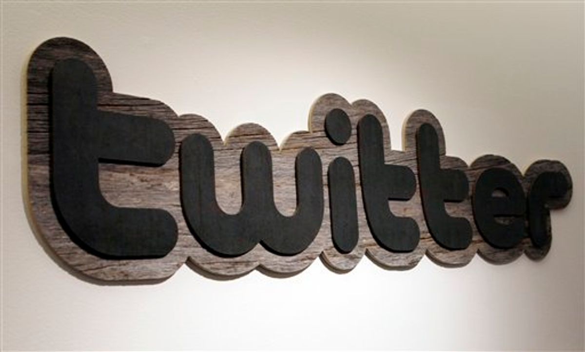 FILE - In this June 23, 2010 file photo, a Twitter sign hangs at the offices of Twitter Inc., in San Francisco. WikiLeaks said Saturday, Jan. 8, 2011 that U.S. investigators have gone to San Francisco-based Twitter Inc. to demand the private messages, contact information and other personal details of Julian Assange and three people associated with the secret-spilling website. The popular micro-blogging site has declined comment. (AP Photo/Jeff Chiu, File) (AP)