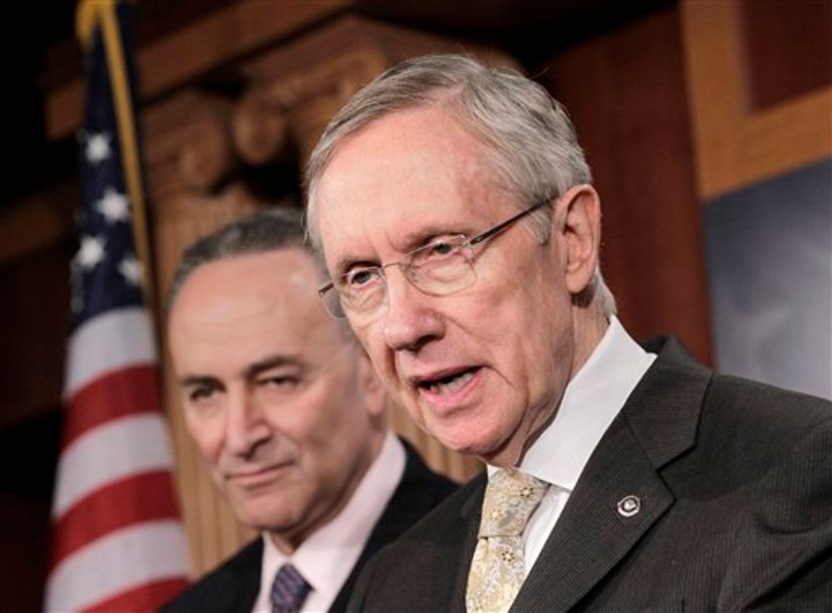 Senate Majority Leader Harry Reid of Nev., accompanied by Sen. Charles Schumer, D-N.Y., speaks during a news conference on Capitol Hill in Washington, Tuesday, Feb. 2, 2011, to respond to Republican critics on health care and the aviation bill. (AP Photo/J. Scott Applewhite)     (AP)