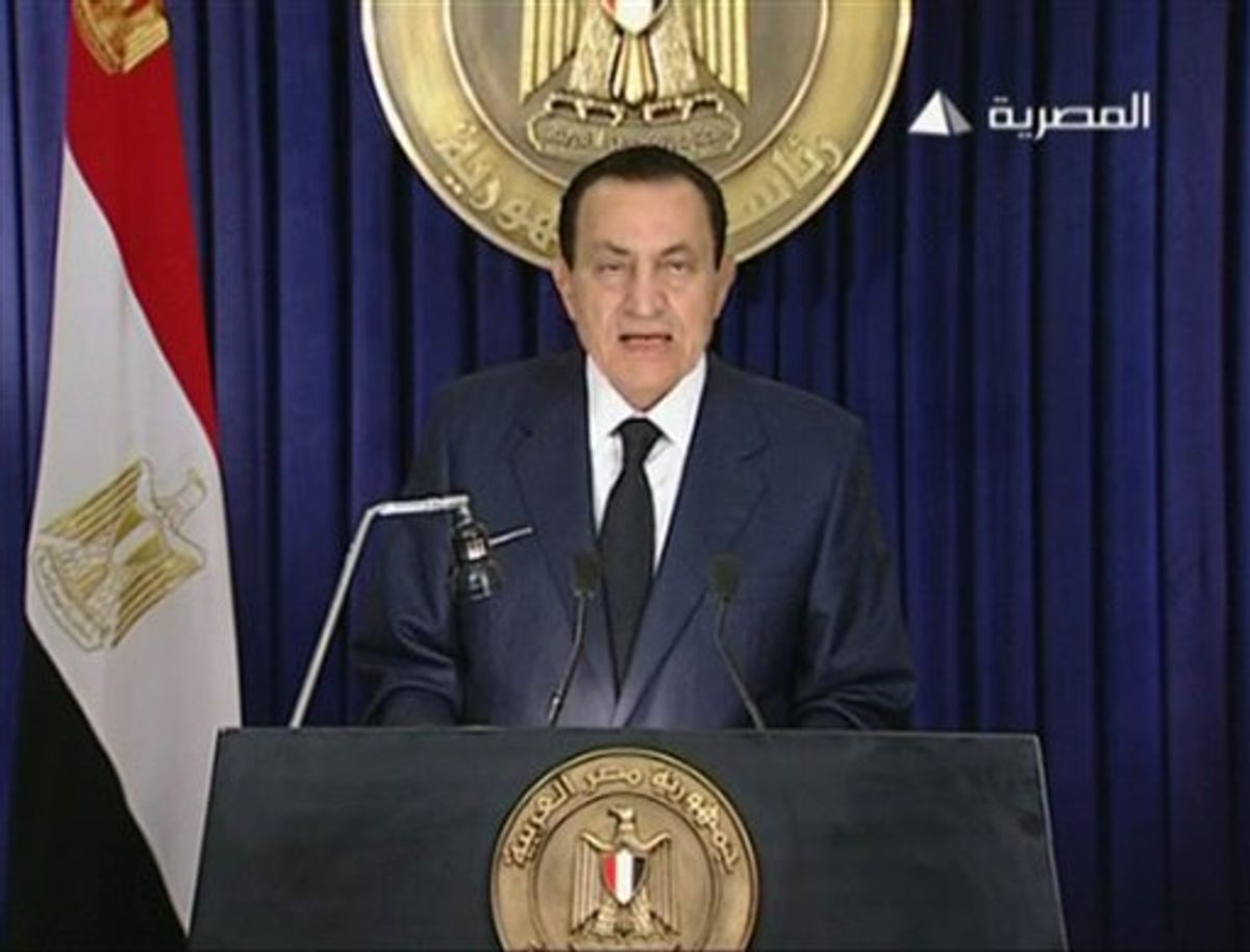In this image from Egyptian state television aired Tuesday evening Feb. 1, 2011, Egyptian President Hosni Mubarak delivers an address announcing he will not run for a new term in office in September elections, but rejected demands that he step down immediately and leave the country, vowing to die on Egypt's soil. (AP Photo/Egyptian State Television via APTN) EGYPT OUT TV OUT  (AP)