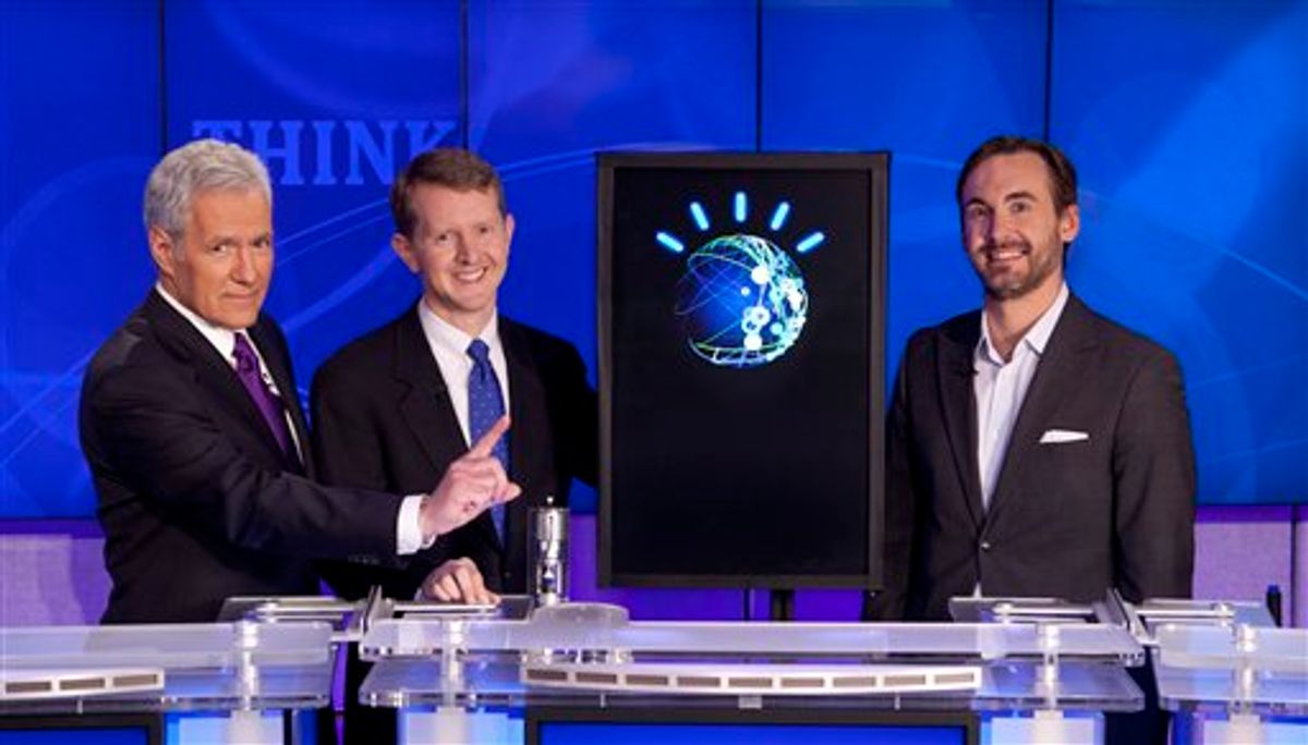 In this undated publicity image released by Jeopardy Productions, Inc., host Alex Trebek, left, poses with contestants Ken Jennings, center, and Brad Rutter and a computer named Watson in Yorktown Heights, N.Y. On Monday, Feb. 14, 2011, "Jeopardy!" will begin airing two matches spread over three days between Jennings, Rutter and Watson, who was developed by IBM scientists. (AP Photo/Jeopardy Productions, Inc.) NO SALES (AP)