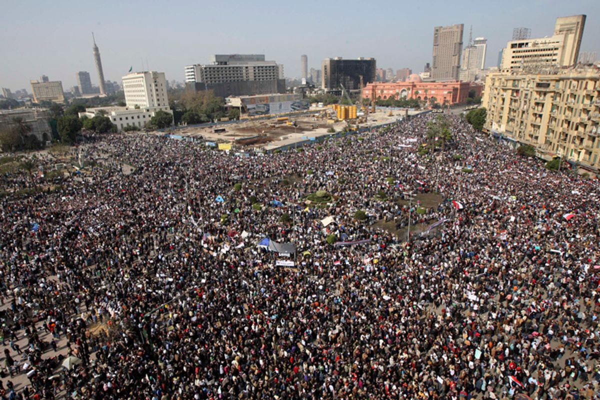 The crowd gathers in Tahrir, or Liberation, Square in Cairo, Egypt, Tuesday, Feb. 1, 2011. Tens of thousands of people flooded into the heart of Cairo Tuesday, filling the city's main square as a call for a million protesters was answered by the largest demonstration in a week of unceasing demands for President Hosni Mubarak to leave after nearly 30 years in power. (AP Photo/Khalil Hamra) (Khalil Hamra)
