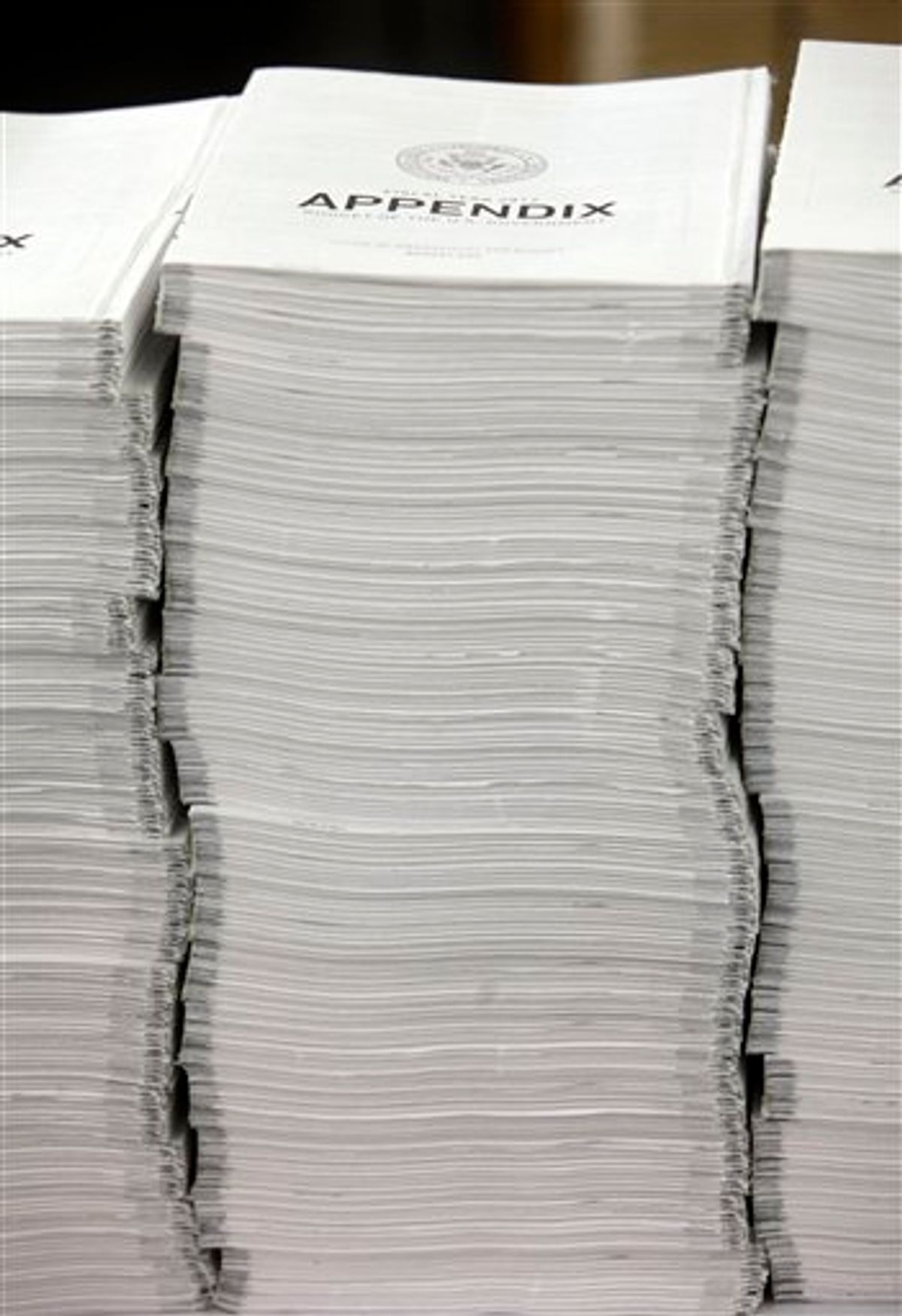 In this photo taken Feb. 10, 2011, stacks of the appendix of the 2012 budget wait to be bound at the U.S. Government Printing Office at Washington. President Barack Obama Obama will send his 2012 budget proposal to Congress on Monday, Feb. 14.  According to an Office of Management and Budget summary obtained by The Associated Press, the administration will propose more than $1 trillion in deficit reduction over the next decade with two-thirds of that amount coming from spending cuts.  (AP Photo/Jacquelyn Martin) (AP)
