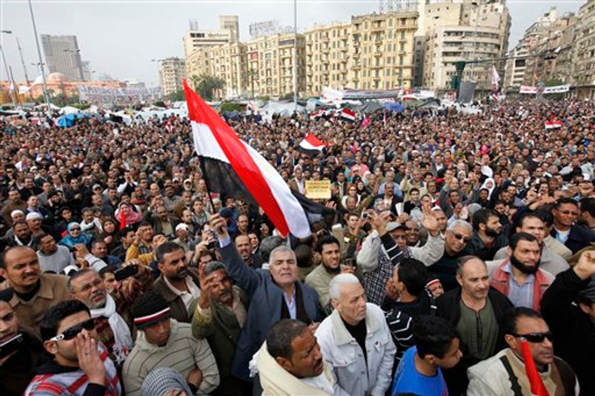 Thousands of anti-government protesters gather in Tahrir Square, Cairo, Egypt, Monday, Feb. 7, 2011. The protests, which saw tens of thousands of people massing daily in downtown Cairo for demonstrations that at times turned violent, have raised questions about the impact on the economy. More than 160,000 foreign tourists fled the country in a matter of days last week, in an exodus sure to hammer the vital tourism sector. (AP Photo/Manoocher Deghati) (AP)