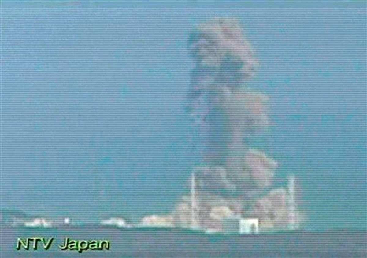 Smoke ascends from the Fukushima Dai-ichi nuclear plant's Unit 3 in Okumamachi, Fukushima Prefecture, northern Japan, Monday, March 14, 2011.