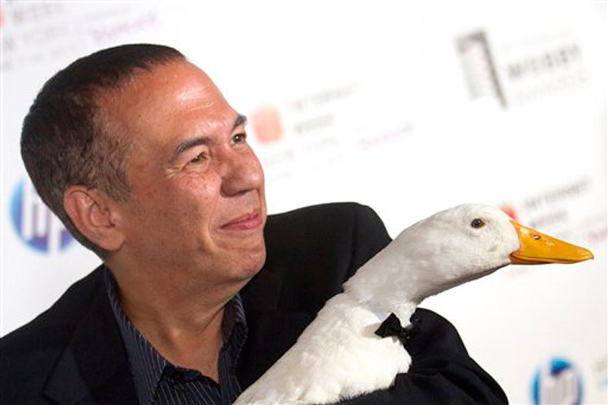 Gilbert Gottfried arrives with the Aflac Duck to the 14th Annual Webby Awards in New York, Monday, June 14, 2010. (AP Photo/Charles Sykes) (Charles Sykes)