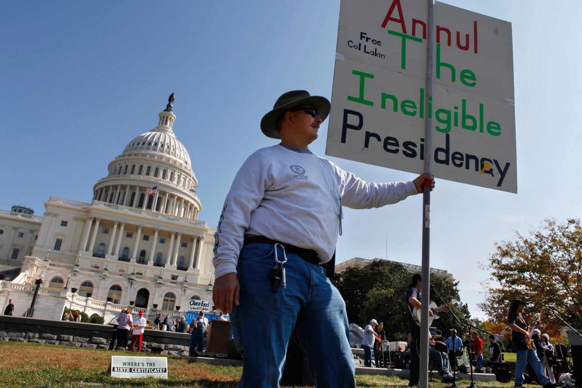 John Balazek of La Plata, Md., attends a rally by the U.S. Capitol in Washington Saturday, Oct. 23, 2010. Participants at the rally, organized under the name of Obama birth certificate rally, call into question the president's eligibility.  (AP Photo/Jacquelyn Martin) (Associated Press)