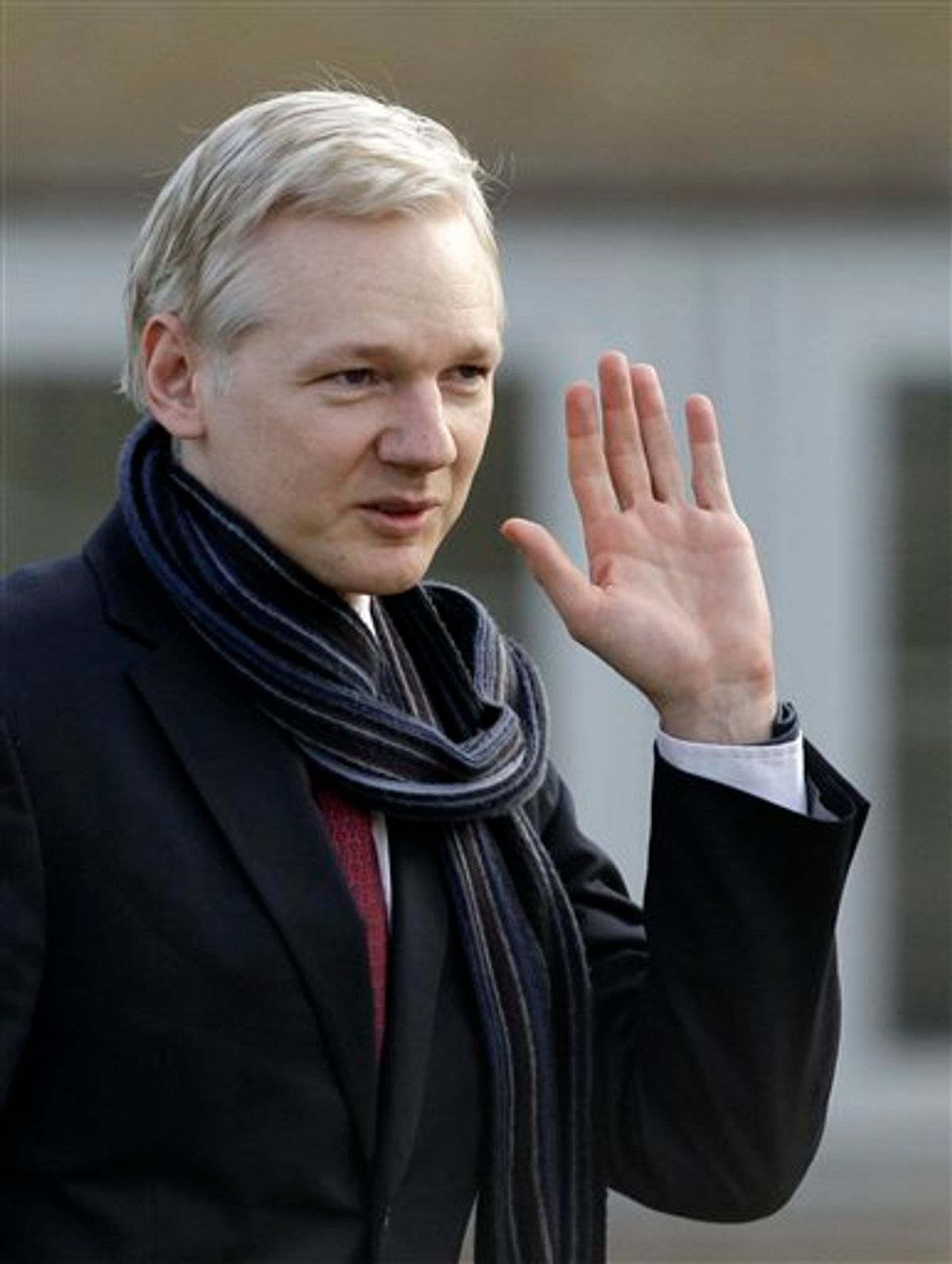 The founder of WikiLeaks Julian Assange waves as he leaves after speaking to the media after his extradition hearing at Belmarsh Magistrates' Court in London, Thursday, Feb. 24, 2011.  Julian Assange can be extradited to Sweden in a sex crimes inquiry, a British judge ruled Thursday, rejecting claims by the WikiLeaks founder that he would not face a fair trial there. Assange's lawyer said he would appeal.  Judge Howard Riddle said the allegations of rape and sexual molestation by two women against Assange meet the definition of extraditable offenses and said the Swedish warrant had been properly issued and was valid.  (AP Photo/Matt Dunham) (AP)