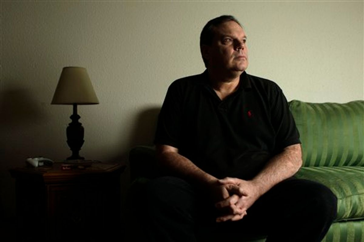 In a March 30, 2011 photo, Peter Gordon poses for a photo in his apartment, in St. Louis. Gordon, who has been out of work for a year, could lose his unemployment benefits in coming months because of efforts by several Republican Missouri state senators to block the use of an estimated $105 million of federal unemployment benefits. (AP Photo/Jeff Roberson) (AP)