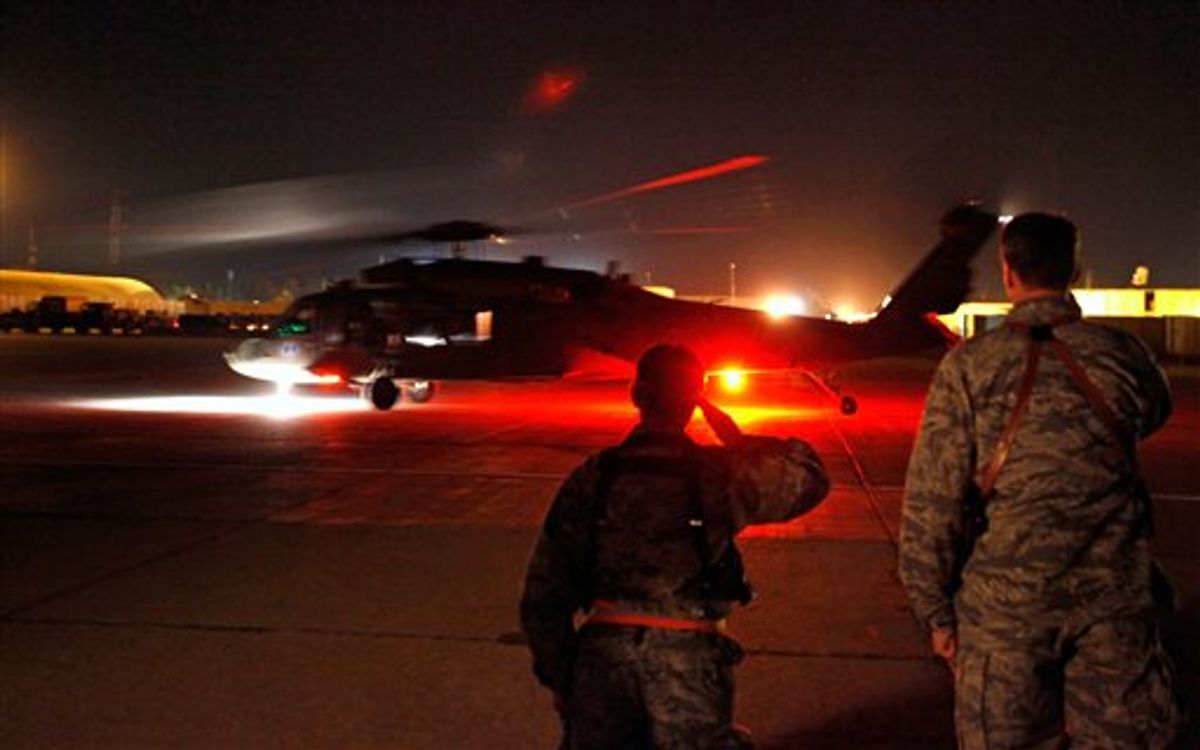 A Blackhawk helicopter with U.S. Defense Secretary Robert Gates and U.S. Army Gen. Lloyd Austin, commanding general of U.S. Forces in Iraq, on board taxis on the tarmac after Gates' arrival Wednesday, April 6, 2011 in Baghad, Iraq. (AP Photo/Chip Somodevilla, Pool)  (AP)