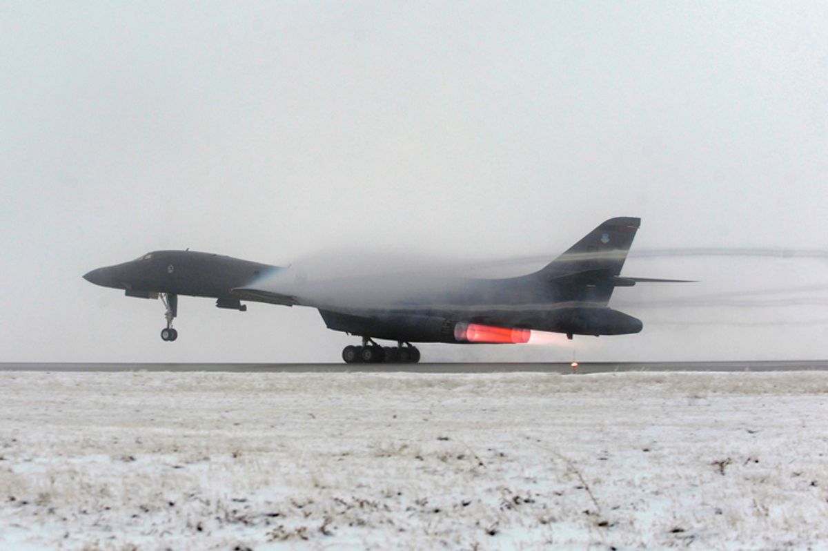 A B-1B Lancer strategic bomber takes off from Ellsworth Air Force Base, in support of Operation Odyssey Dawn in Libya, in this U.S. Air Force handout photo dated March 27, 2011. This mission marked the first time the B-1 fleet has launched combat sorties from the continental United States to strike targets overseas. Picture taken March 27, 2011. REUTERS/U.S. Air Force/Staff Sgt. Marc I. Lane/Handout (UNITED STATES - Tags: MILITARY CONFLICT POLITICS) FOR EDITORIAL USE ONLY. NOT FOR SALE FOR MARKETING OR ADVERTISING CAMPAIGNS. THIS IMAGE HAS BEEN SUPPLIED BY A THIRD PARTY. IT IS DISTRIBUTED, EXACTLY AS RECEIVED BY REUTERS, AS A SERVICE TO CLIENTS (Â© Ho New / Reuters)