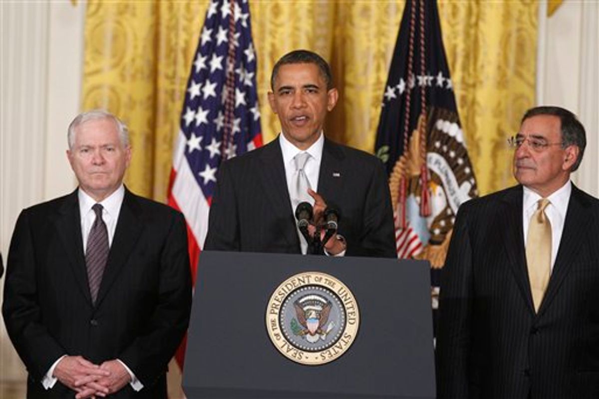President Barack Obama stands with outgoing Defense Secretary Robert Gates, left, and Defense Secretary-nominee Leon Panetta, in the East Room of the White House in Washington, Thursday, April 28, 2011, as he introduced his reworked reworked national security team . (AP Photo/Charles Dharapak)     (AP)