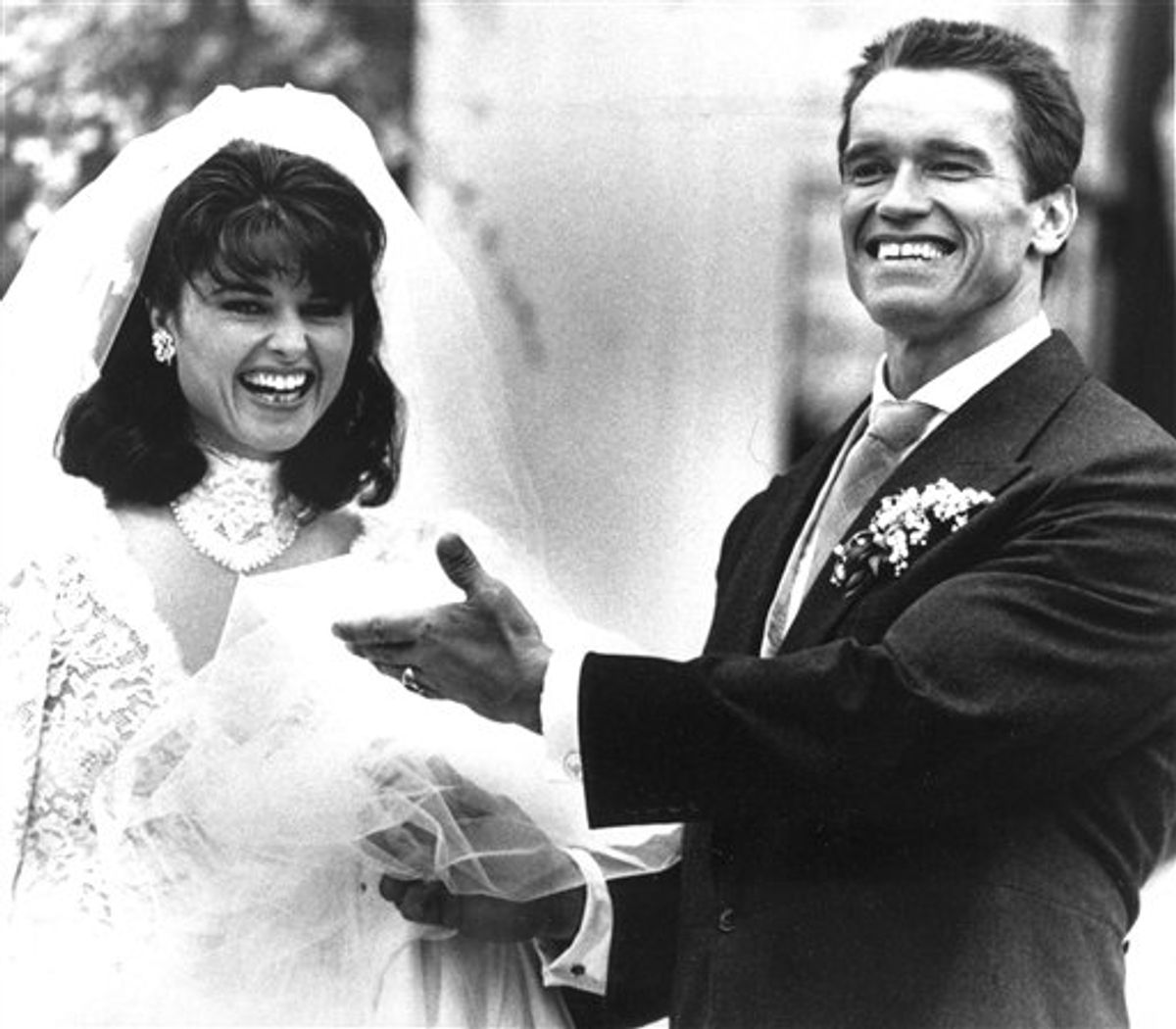 FILE -- In an April 26, 1986 file photo Maria Shriver, left, and Arnold Schwarzenegger pose outside St. Francis Xavier Church, in Hyannis, Mass., after they were married.  Former California Gov. Arnold Schwarzenegger and his wife of 25 years, Maria Shriver, announced Monday May 9, 2011, that they are separating.  (AP Photo/Mike Kullenfile)   (AP)